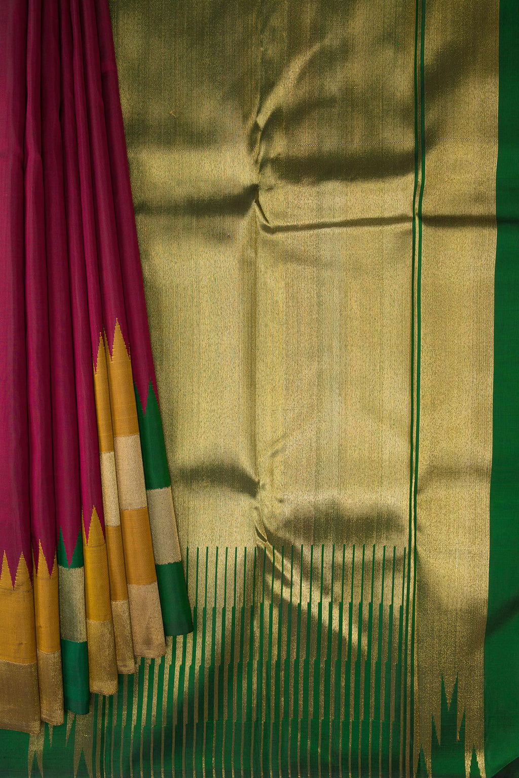 Pleats and pallu of Pure Silk Pure Zari Maroon Kanjivaram Saree with Plain Body and Fancy Border. 