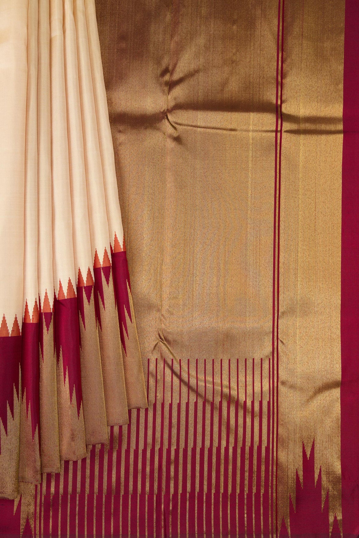 Pleats and pallu of Pure Silk Pure Zari Beige Kanjivaram Saree with Plain Body and Temple Border. 