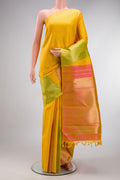 Pure Silk Pure Zari Yellow Kanjivaram Saree with Plain Body and Temple Border.  displayed on a mannequin