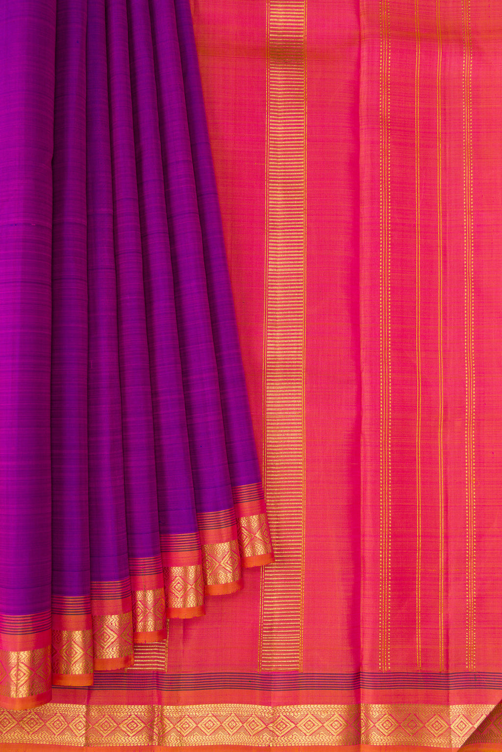 Pleats and pallu of Purple Kanjivaram Silk Saree with Plain Body and Zari Border. 