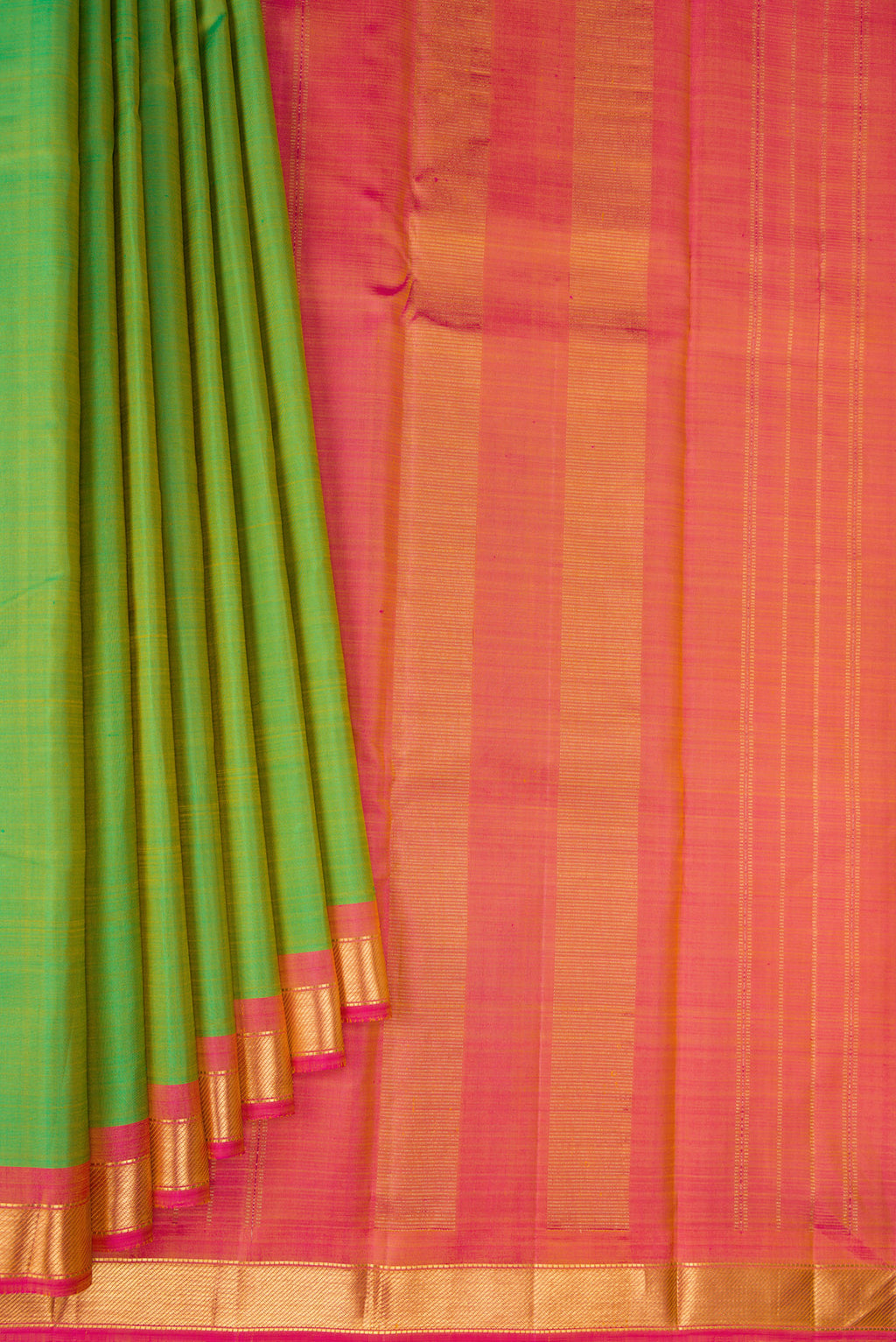 Pleats and pallu of Green Kanjivaram Silk Saree with Plain Body and Zari Border. 
