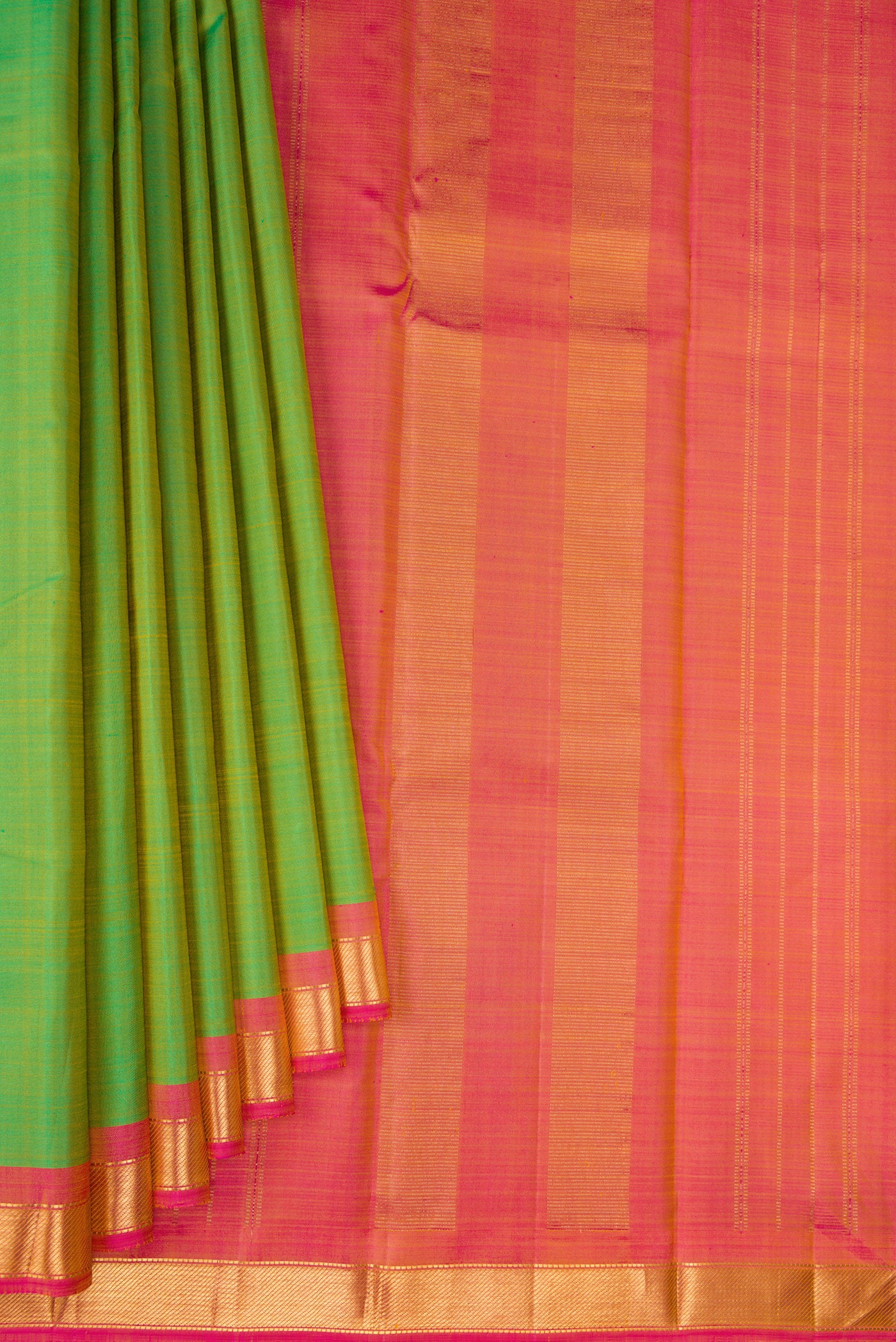 Pleats and pallu of Green Kanjivaram Silk Saree with Plain Body and Zari Border. 