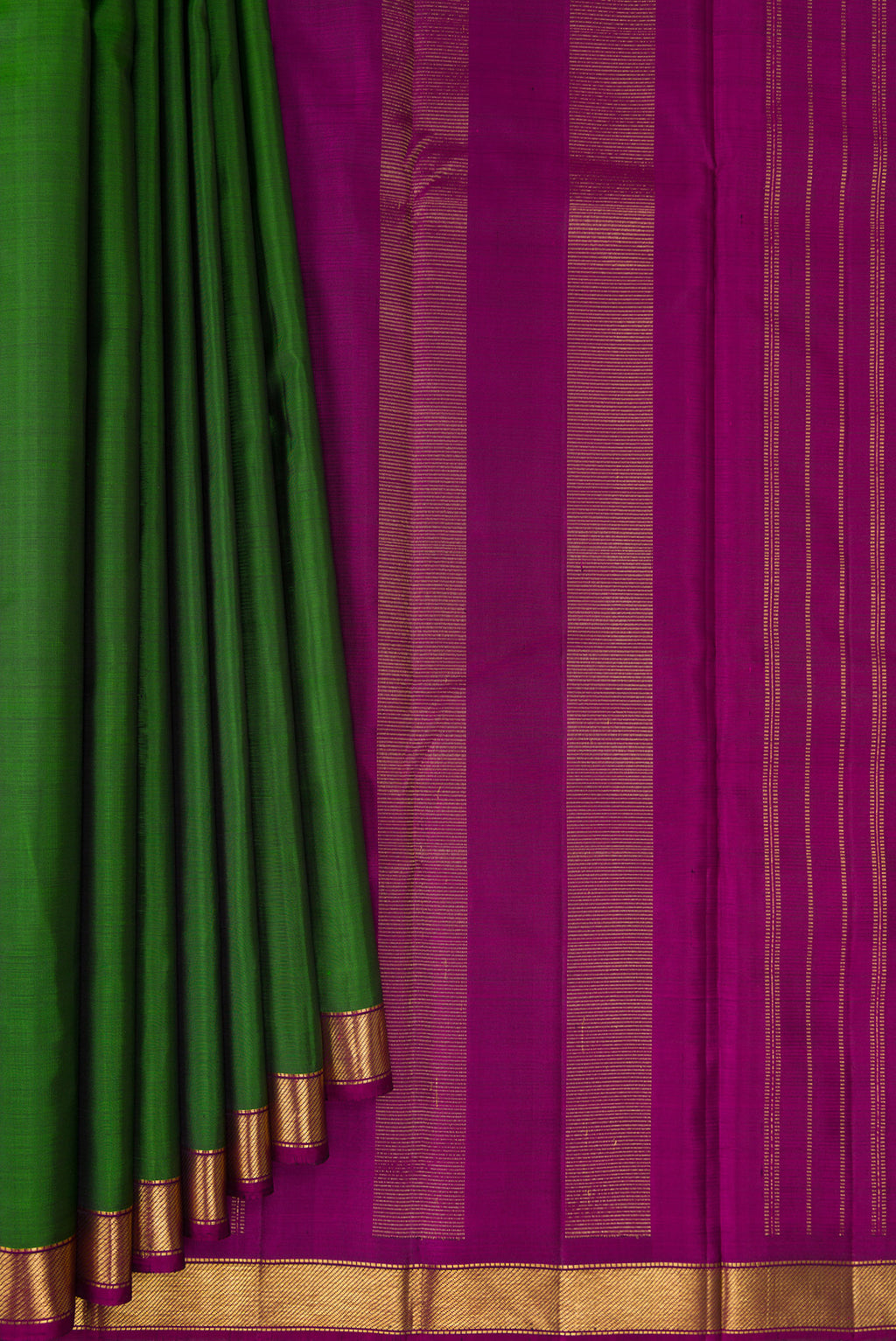 Pleats and pallu of Green Kanjivaram Silk Saree with Plain Body and Zari Border. 