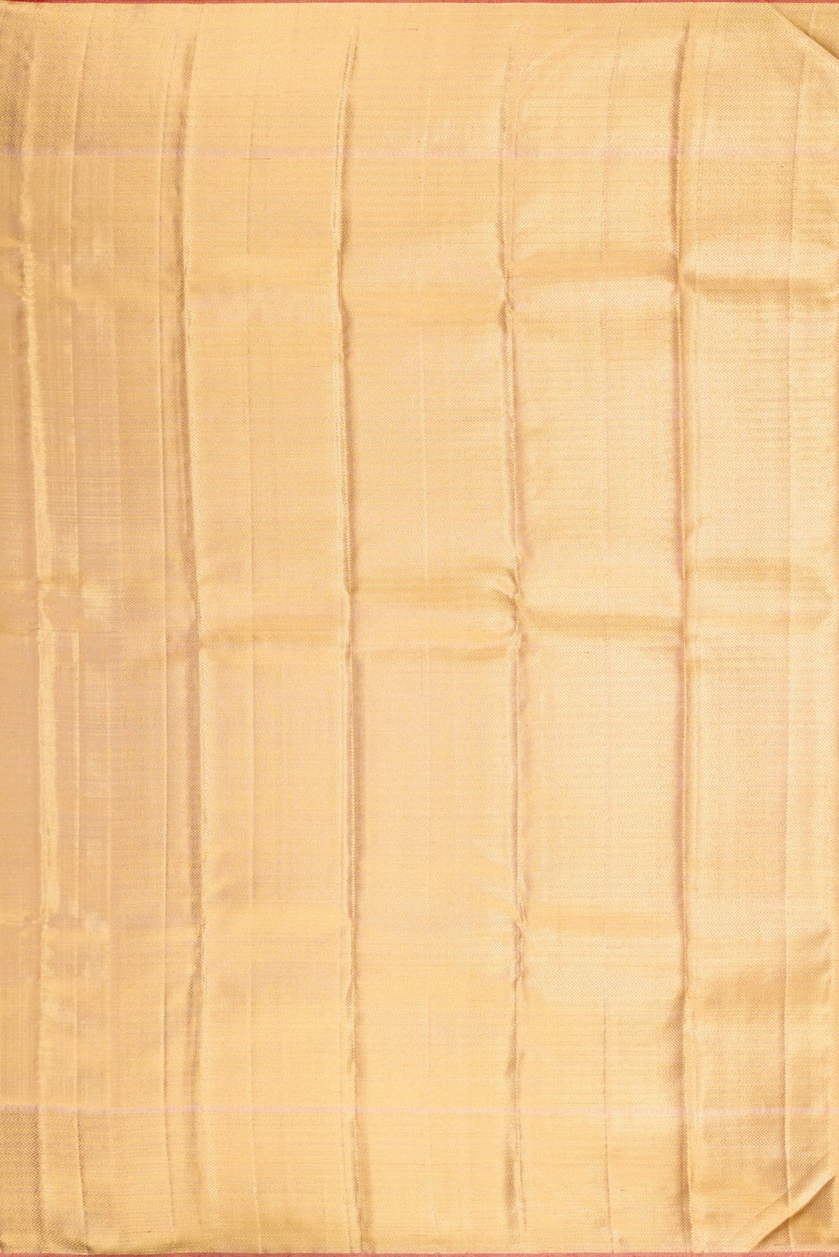 Close up image of the pallu of Pure Silk Pure Zari Gold Dual Tone Kanjivaram Tissue Saree with Zari Brocade on the body and Zari Border. 