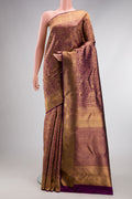 Pure Silk Pure Zari Purple Kanjivaram Saree with Zari Brocade on the body and Zari Border.  displayed on a mannequin