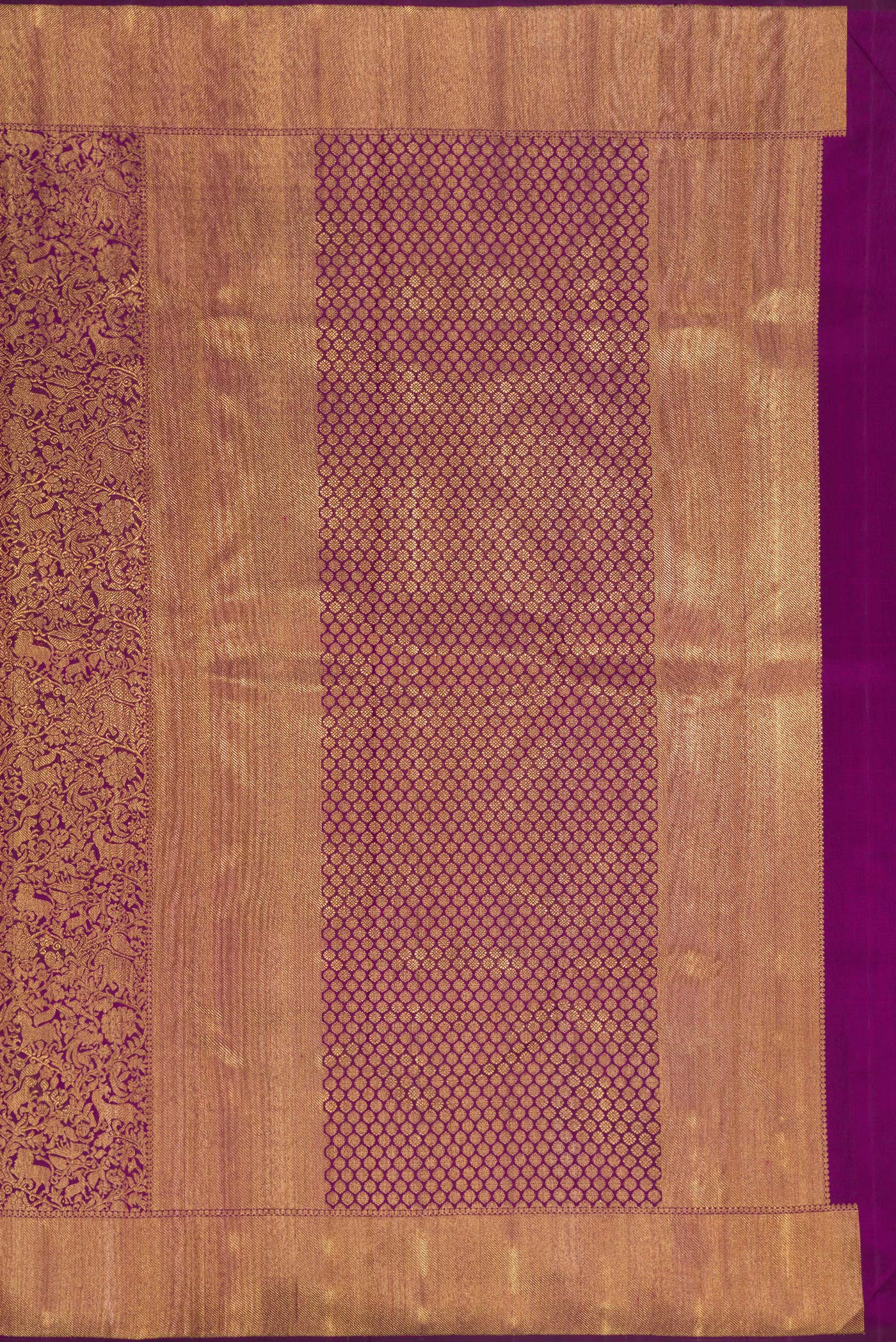 Close up image of the pallu of Pure Silk Pure Zari Purple Kanjivaram Saree with Zari Brocade on the body and Zari Border. 