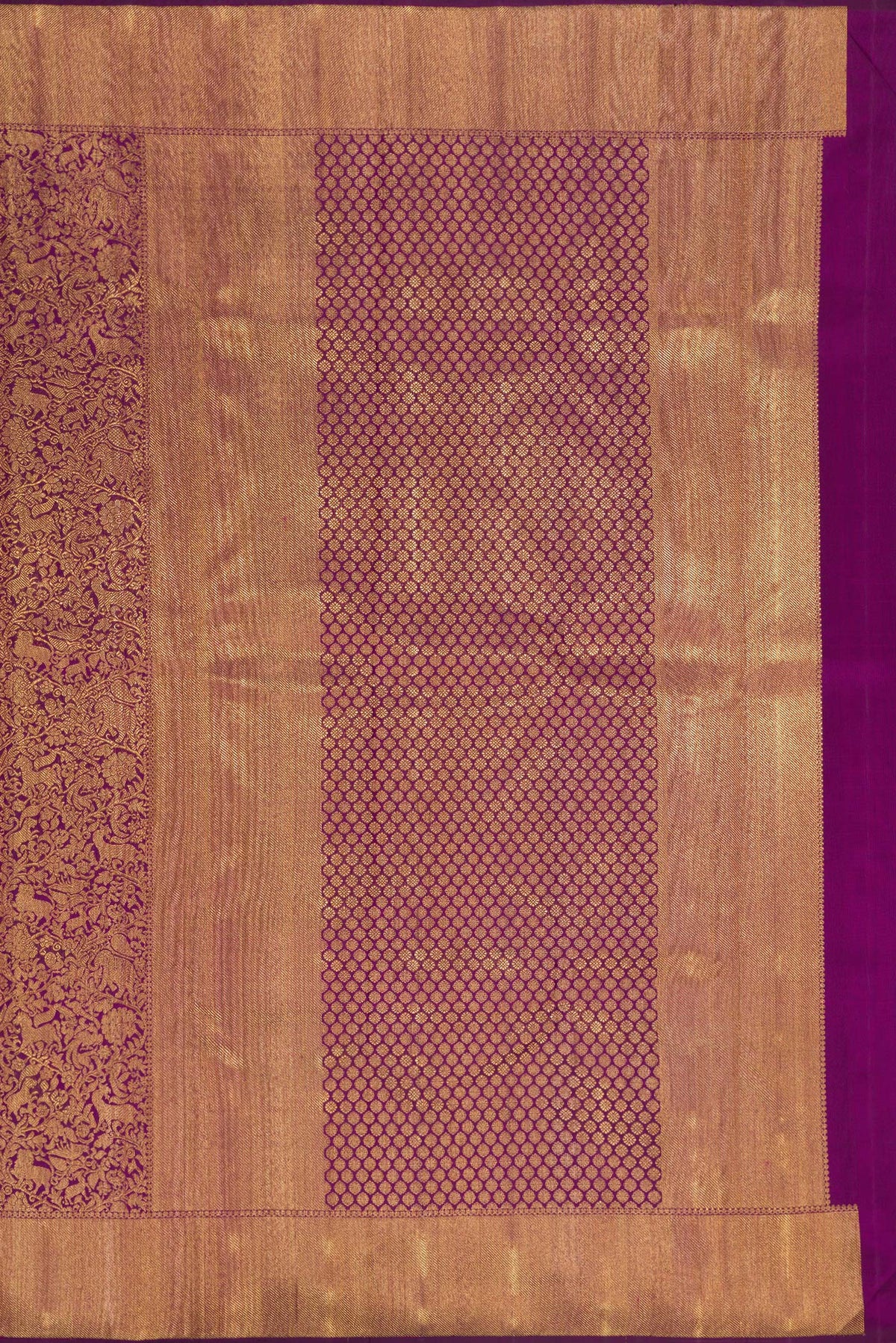 Close up image of the pallu of Pure Silk Pure Zari Purple Kanjivaram Saree with Zari Brocade on the body and Zari Border. 