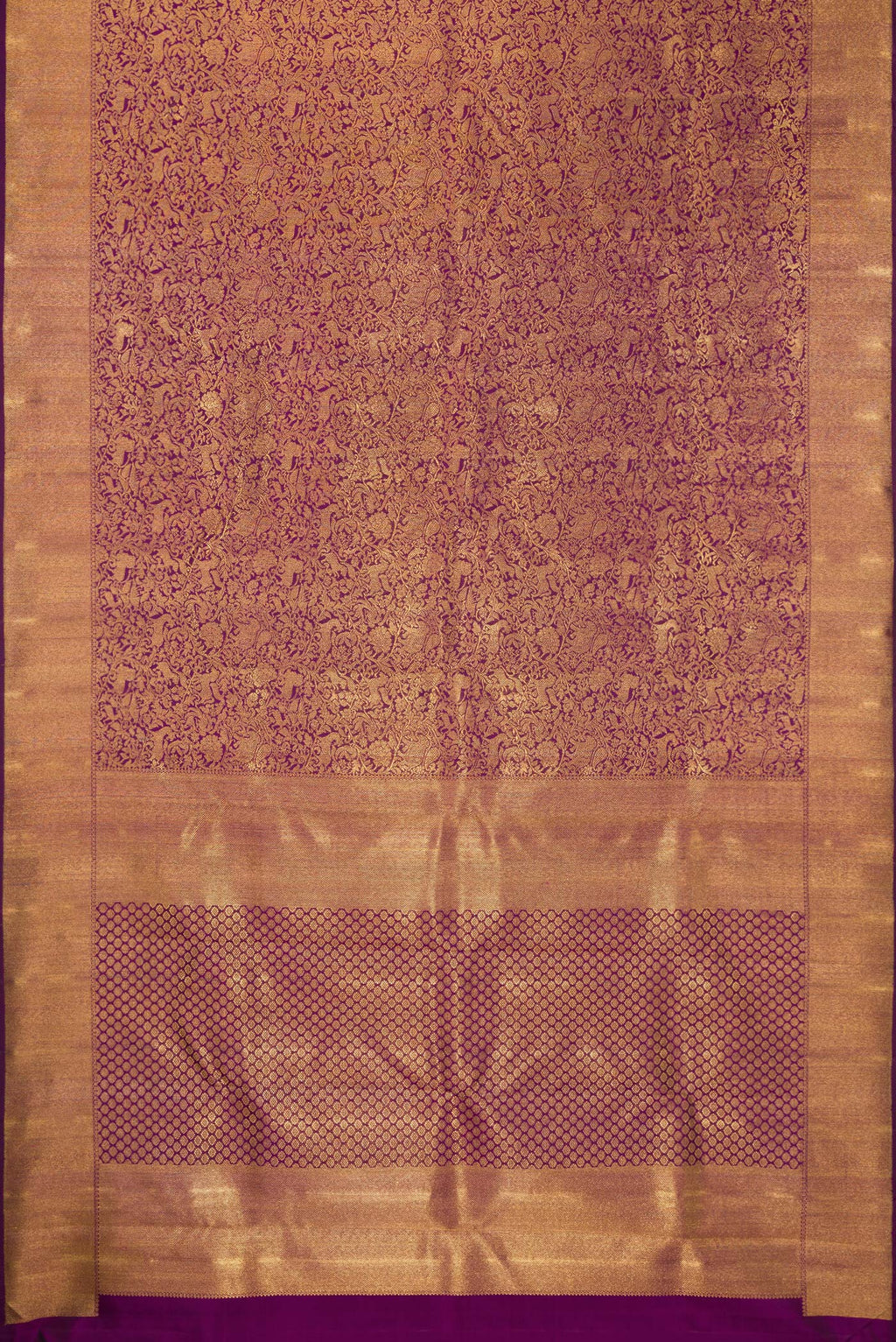 Flat view of Pure Silk Pure Zari Purple Kanjivaram Saree with Zari Brocade on the body and Zari Border. 