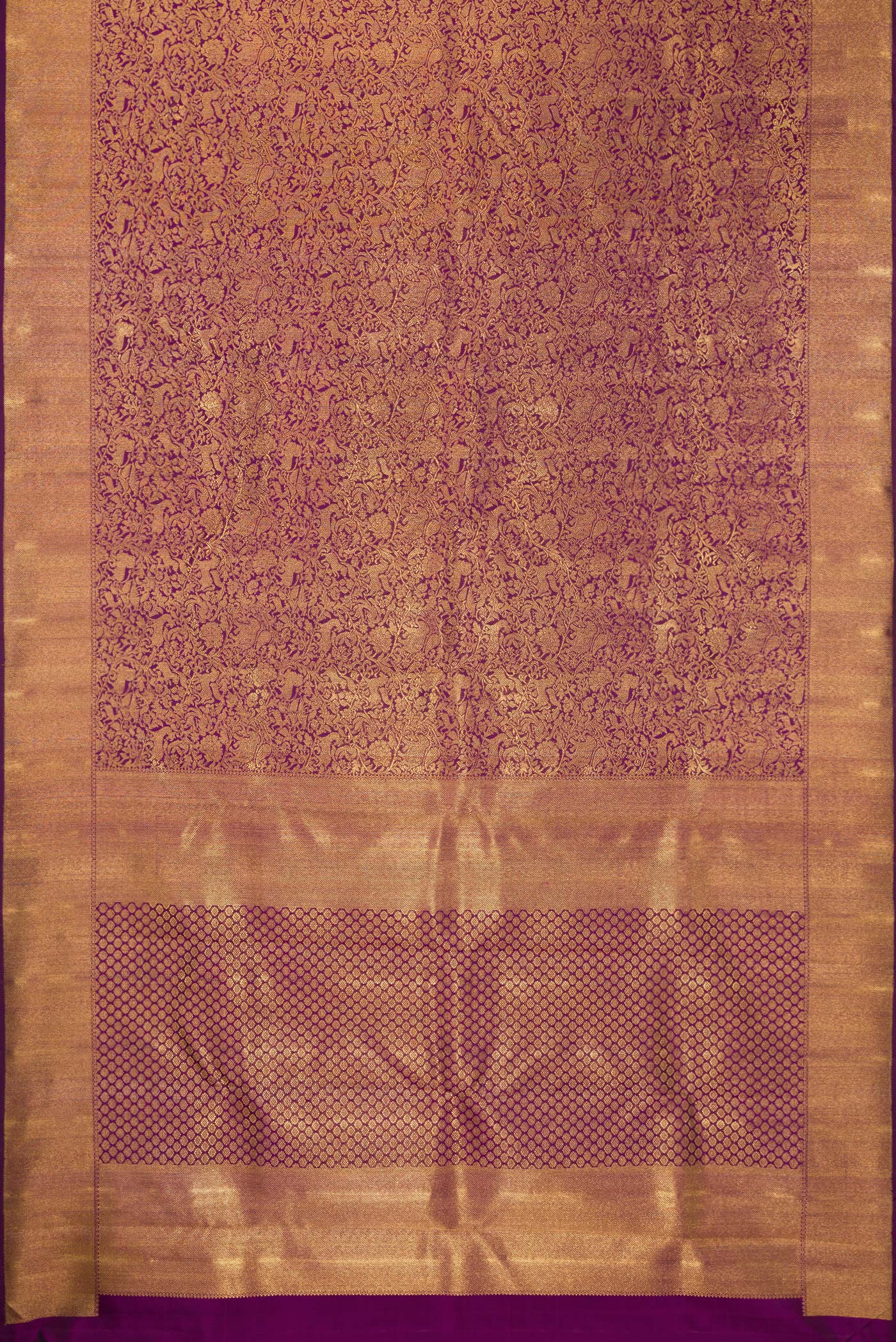 Flat view of Pure Silk Pure Zari Purple Kanjivaram Saree with Zari Brocade on the body and Zari Border. 