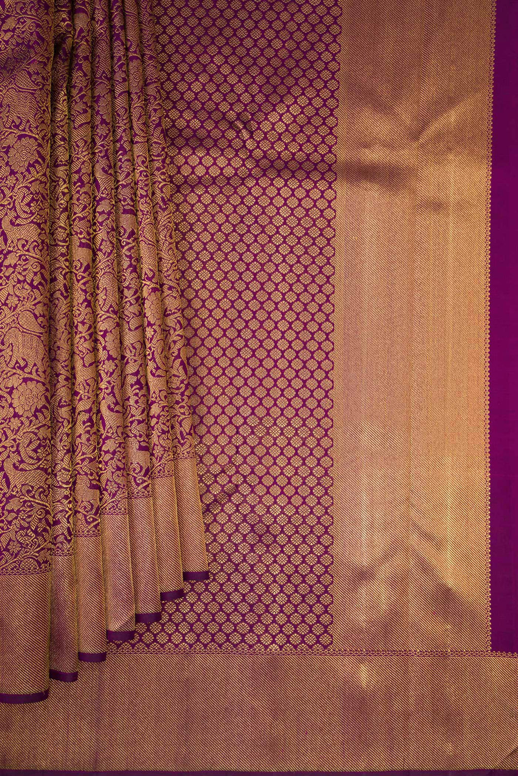 Pleats and pallu of Pure Silk Pure Zari Purple Kanjivaram Saree with Zari Brocade on the body and Zari Border. 