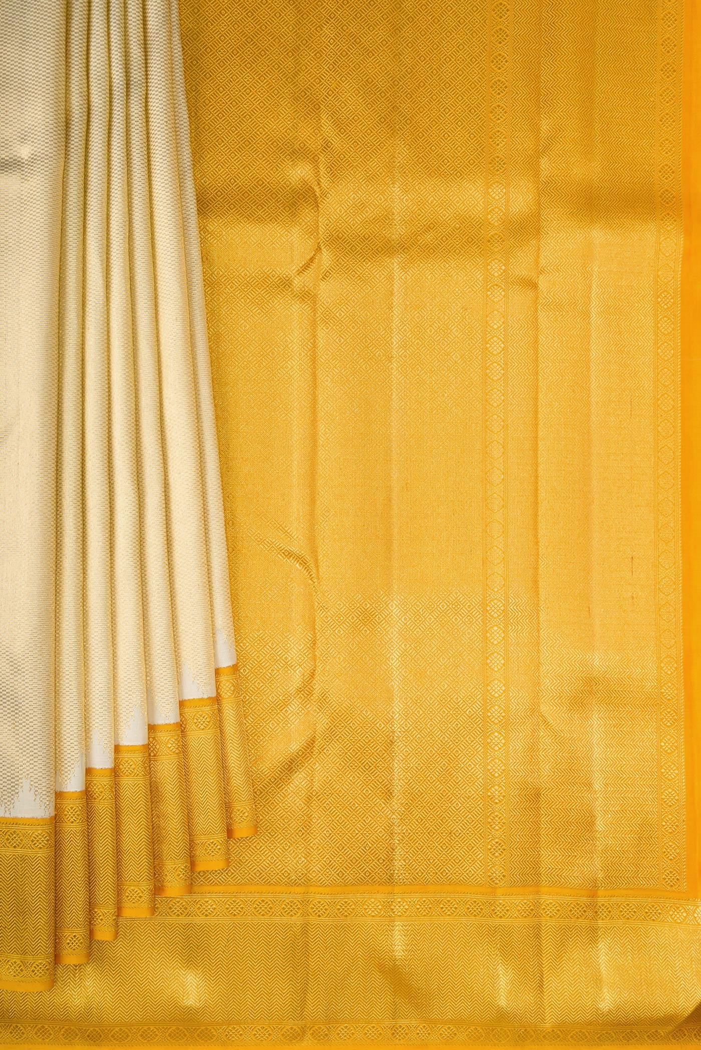 Pleats and pallu of Pure Silk Pure Zari Gold Kanjivaram Saree with Zari Brocade on the body and Zari Border. 