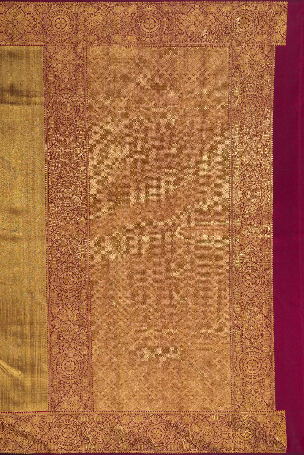 Close up image of the pallu of Maroon Dual Tone Kanjivaram Silk Saree with Zari Brocade on the body and Zari Border. 
