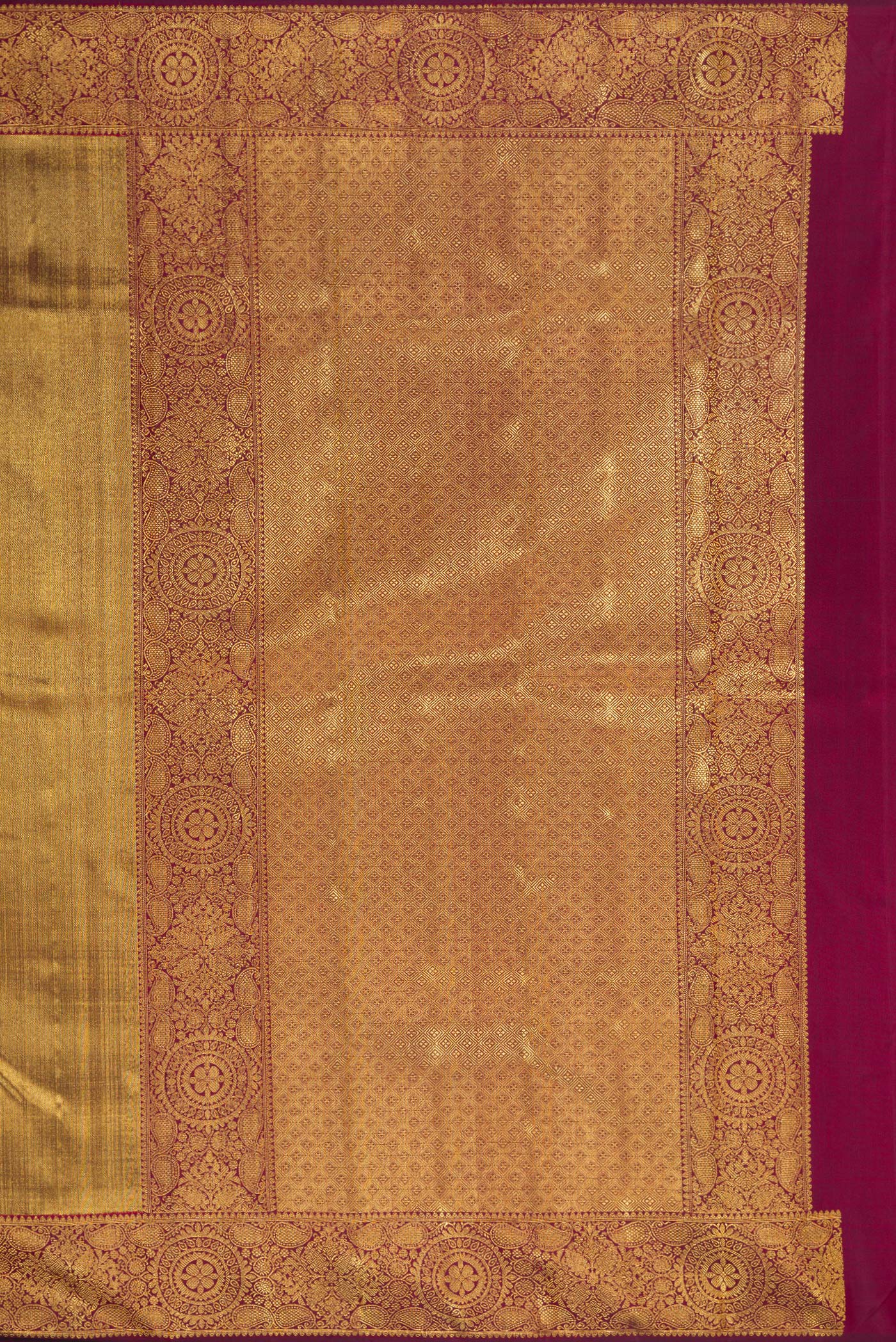 Close up image of the pallu of Maroon Dual Tone Kanjivaram Silk Saree with Zari Brocade on the body and Zari Border. 