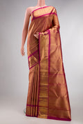 Pure Silk Pure Zari Magenta Dual Tone Kanjivaram Saree with Zari Brocade on the body and Zari Border.  displayed on a mannequin