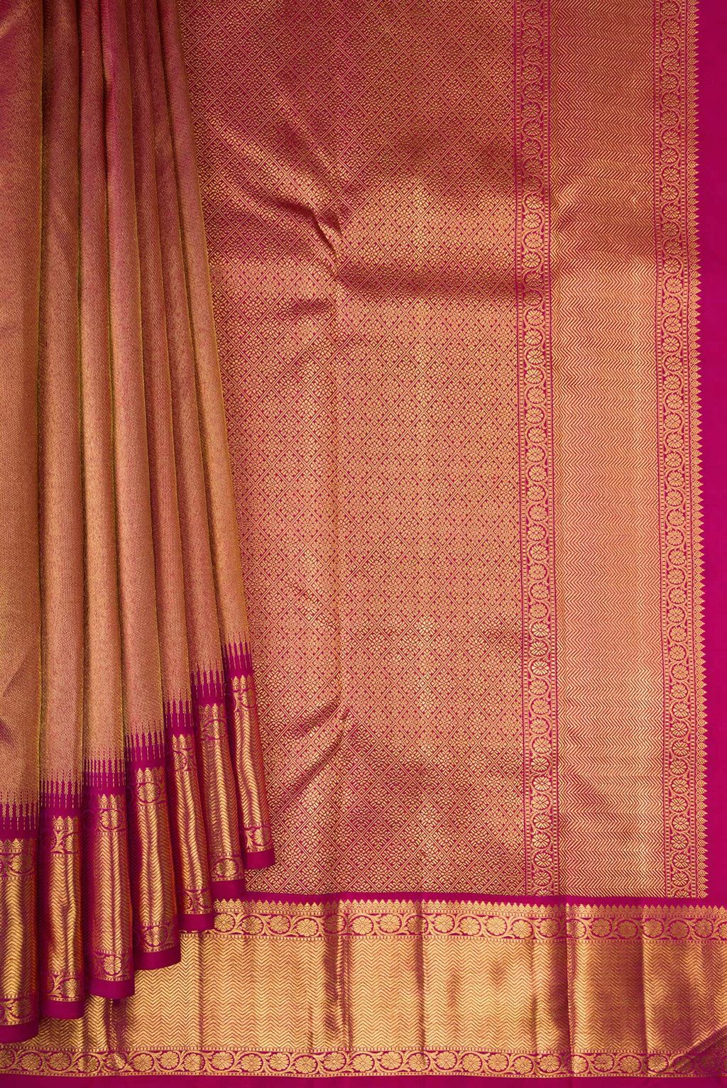 Pleats and pallu of Pure Silk Pure Zari Magenta Dual Tone Kanjivaram Saree with Zari Brocade on the body and Zari Border. 