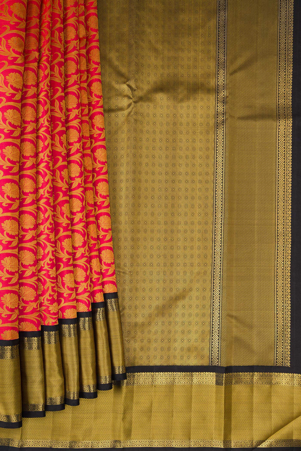 Pleats and pallu of Pure Silk Pure Zari Orange Kanjivaram Saree with Jacquard design on the body and Zari And Thread Border. 