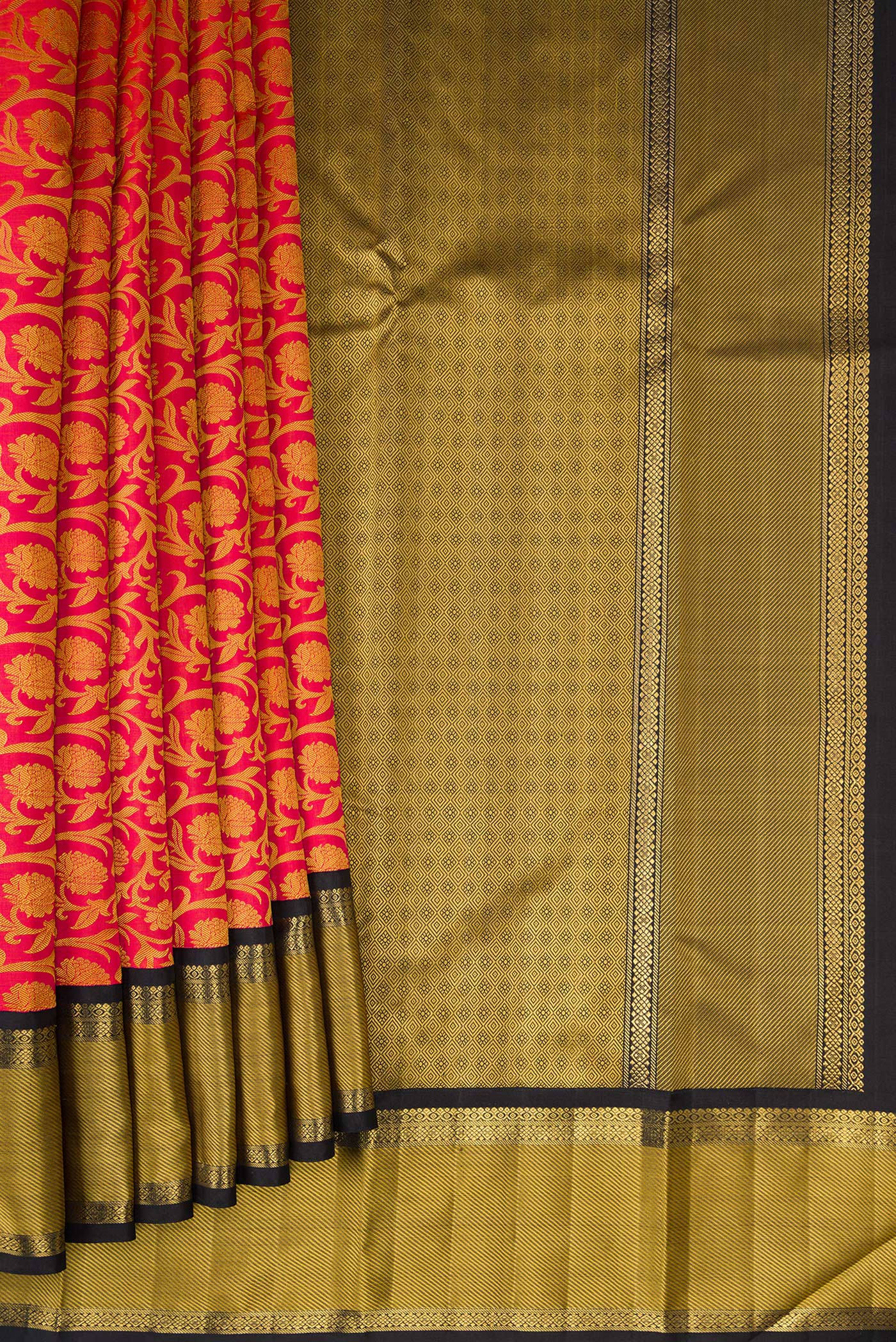 Pleats and pallu of Pure Silk Pure Zari Orange Kanjivaram Saree with Jacquard design on the body and Zari And Thread Border. 