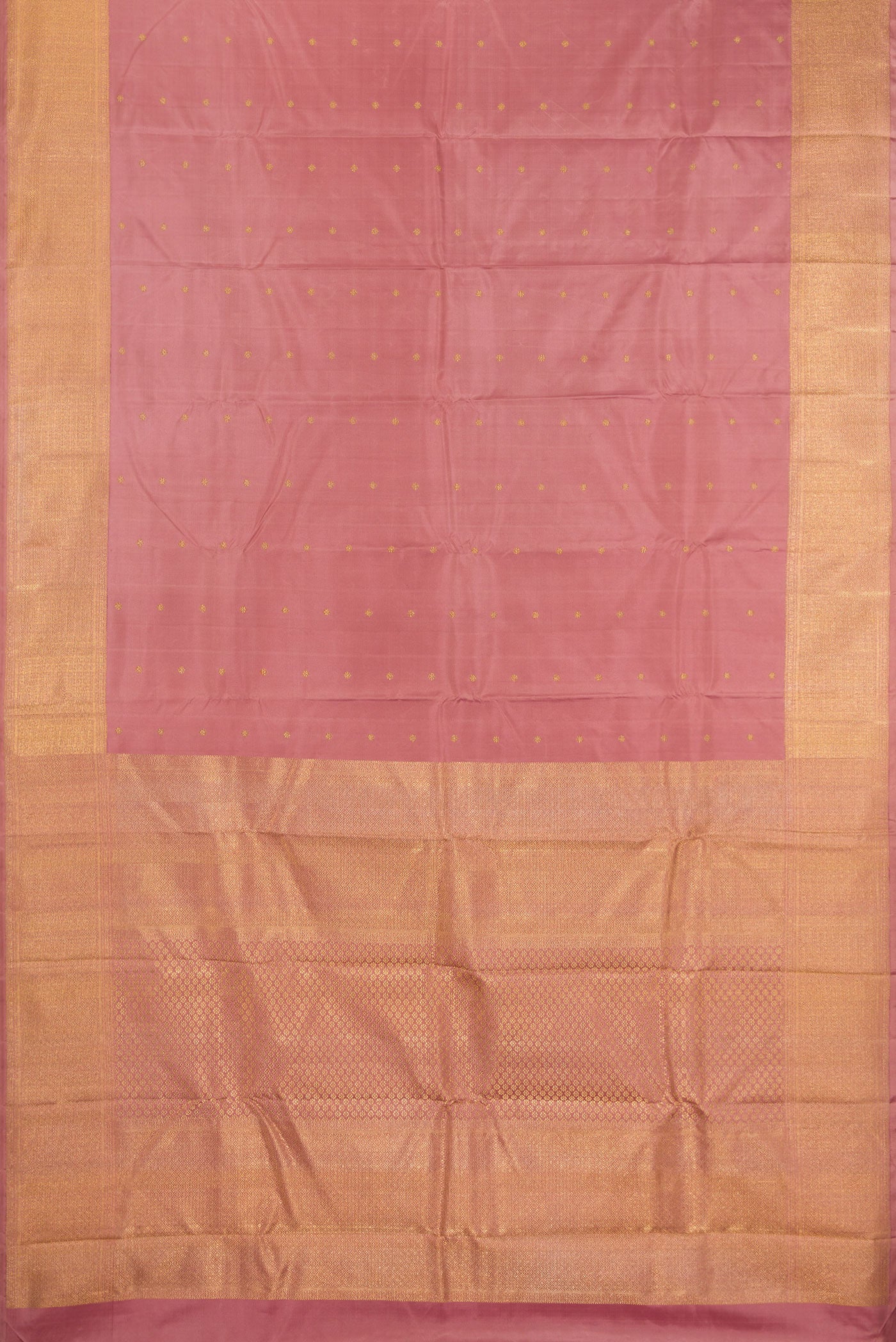 Flat view of Pure Silk Pure Zari Rose Gold Kanjivaram Saree with Zari Butta on the body and Zari Border. 