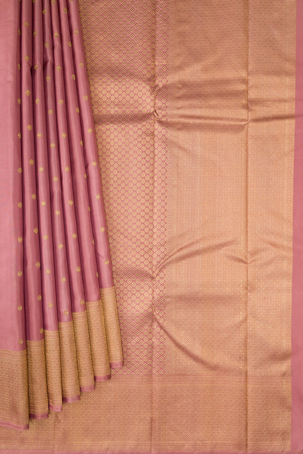 Pleats and pallu of Pure Silk Pure Zari Rose Gold Kanjivaram Saree with Zari Butta on the body and Zari Border. 