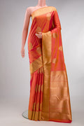 Pure Silk Pure Zari Brick Orange Dual Tone Kanjivaram Saree with Zari Butta on the body and Zari Border.  displayed on a mannequin