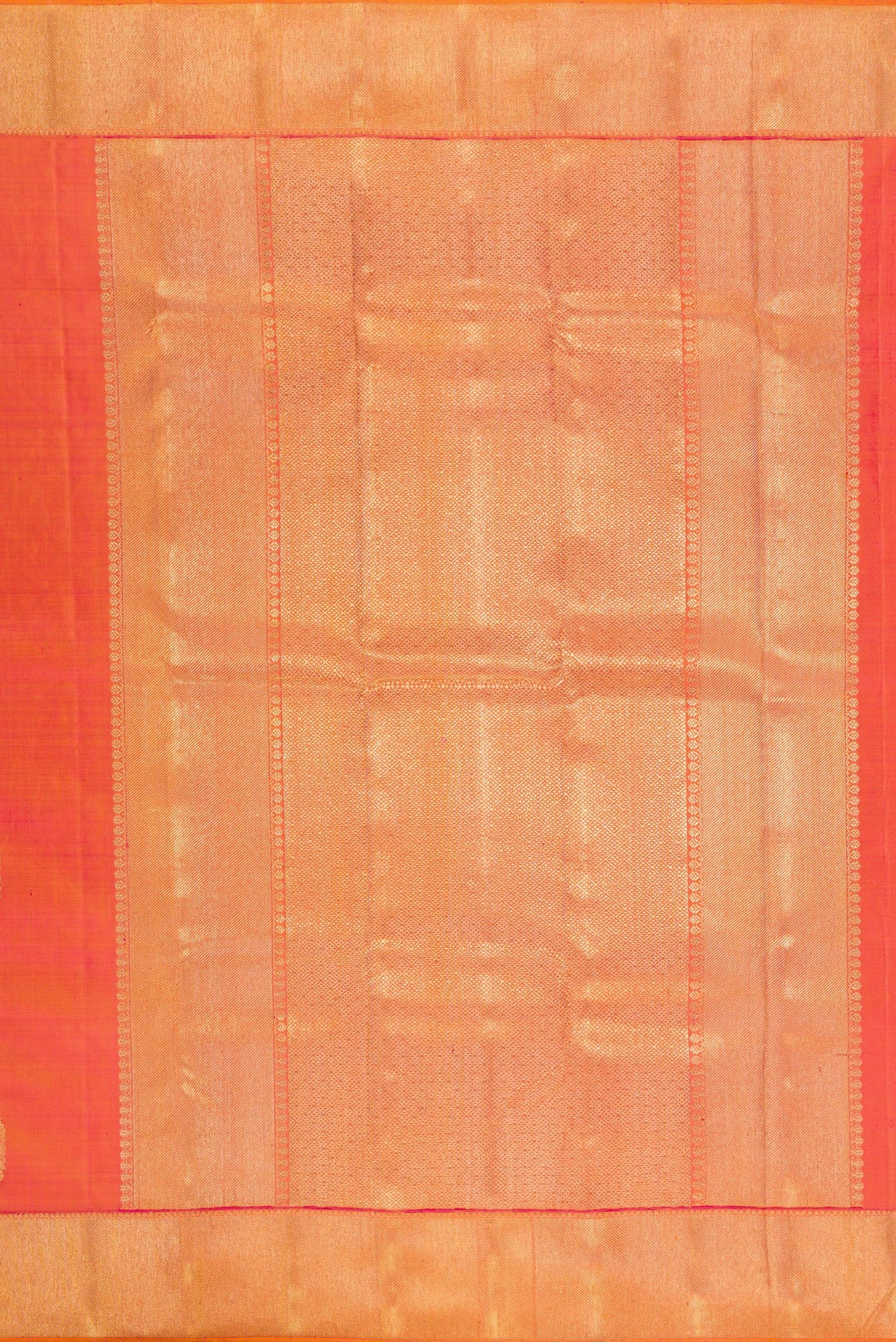 Close up image of the pallu of Pure Silk Pure Zari Brick Orange Dual Tone Kanjivaram Saree with Zari Butta on the body and Zari Border. 