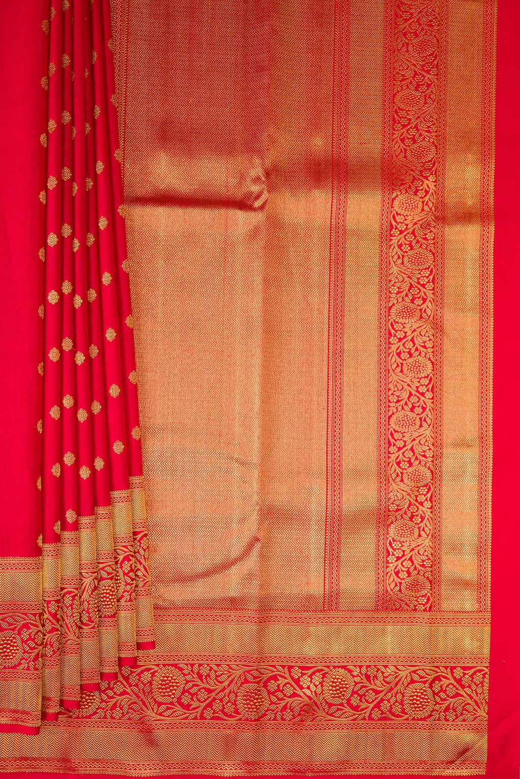 Pleats and pallu of Pure Silk Pure Zari Red Kanjivaram Saree with Zari Butta on the body and Fancy Border. 