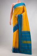 Yellow Kanjivaram Silk Saree with Checked design on the body and Temple Thread Border.  displayed on a mannequin