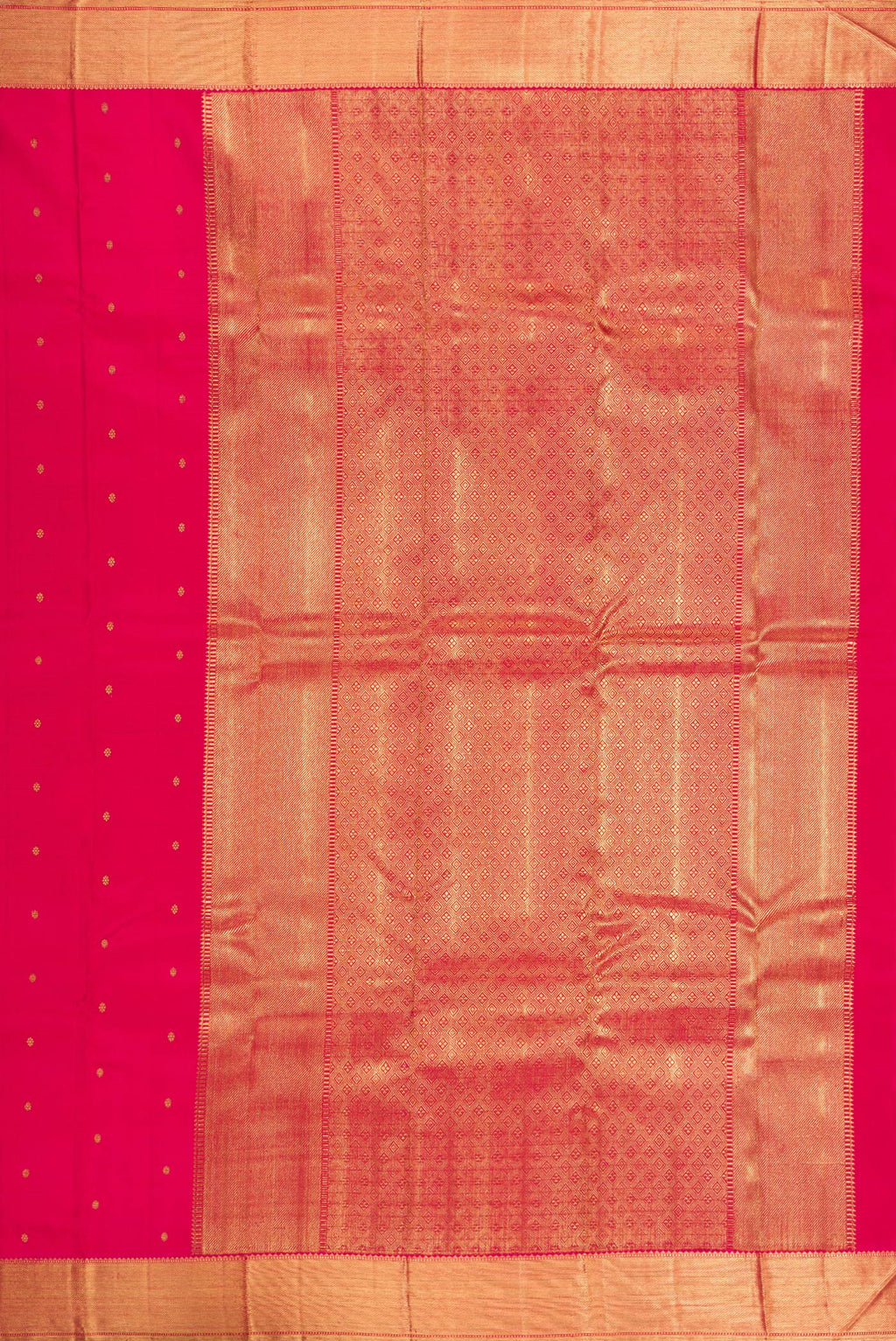 Close up image of the pallu of Pure Silk Pure Zari Dark Pink Kanjivaram Saree with Zari Butta on the body and Zari Border. 