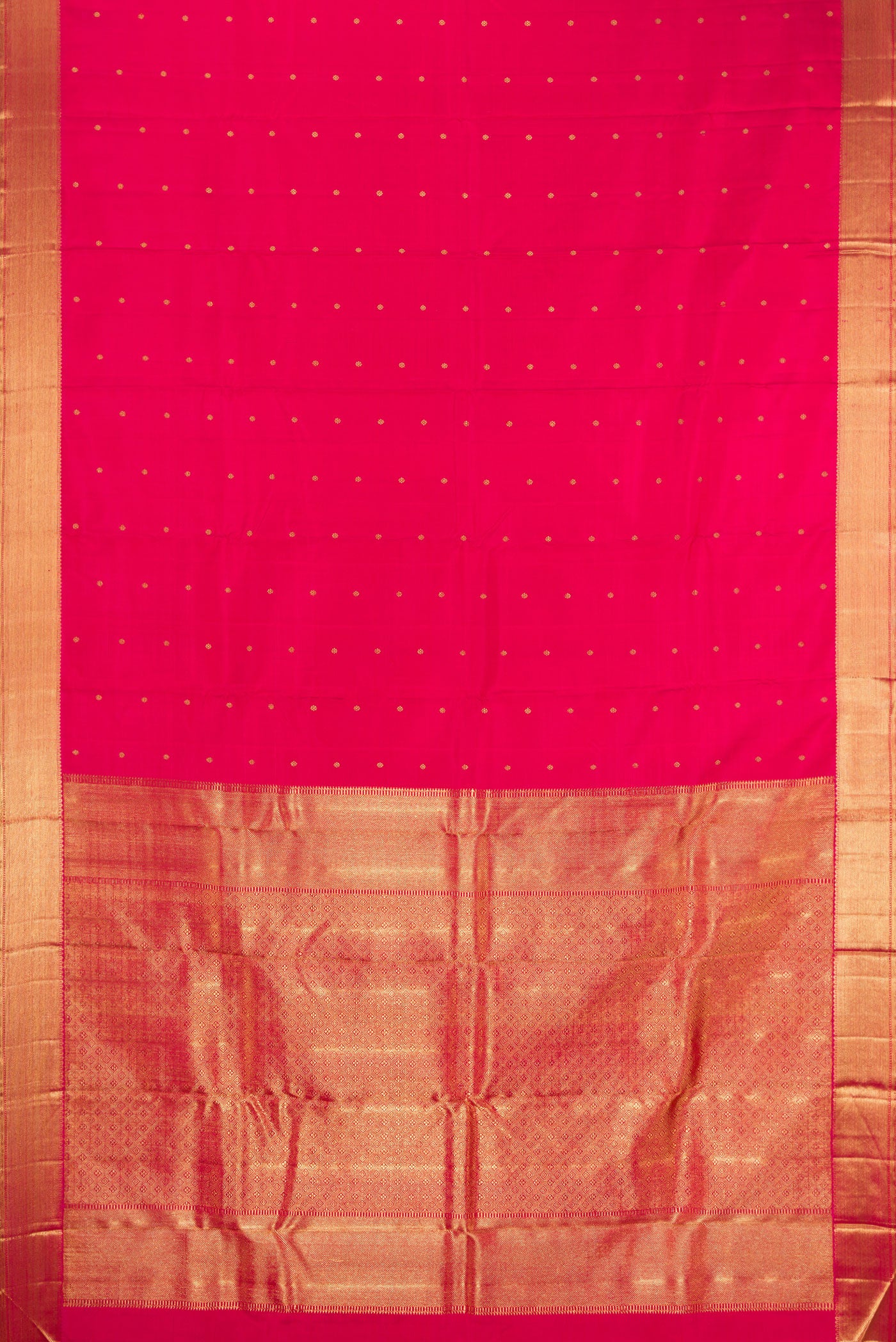Flat view of Pure Silk Pure Zari Dark Pink Kanjivaram Saree with Zari Butta on the body and Zari Border. 