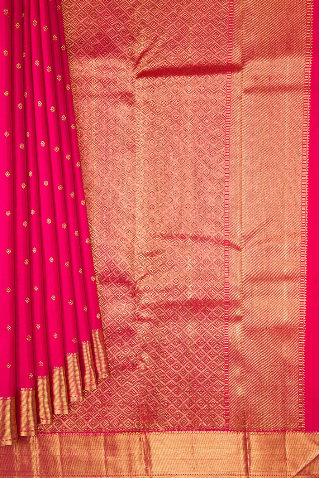 Pleats and pallu of Pure Silk Pure Zari Dark Pink Kanjivaram Saree with Zari Butta on the body and Zari Border. 