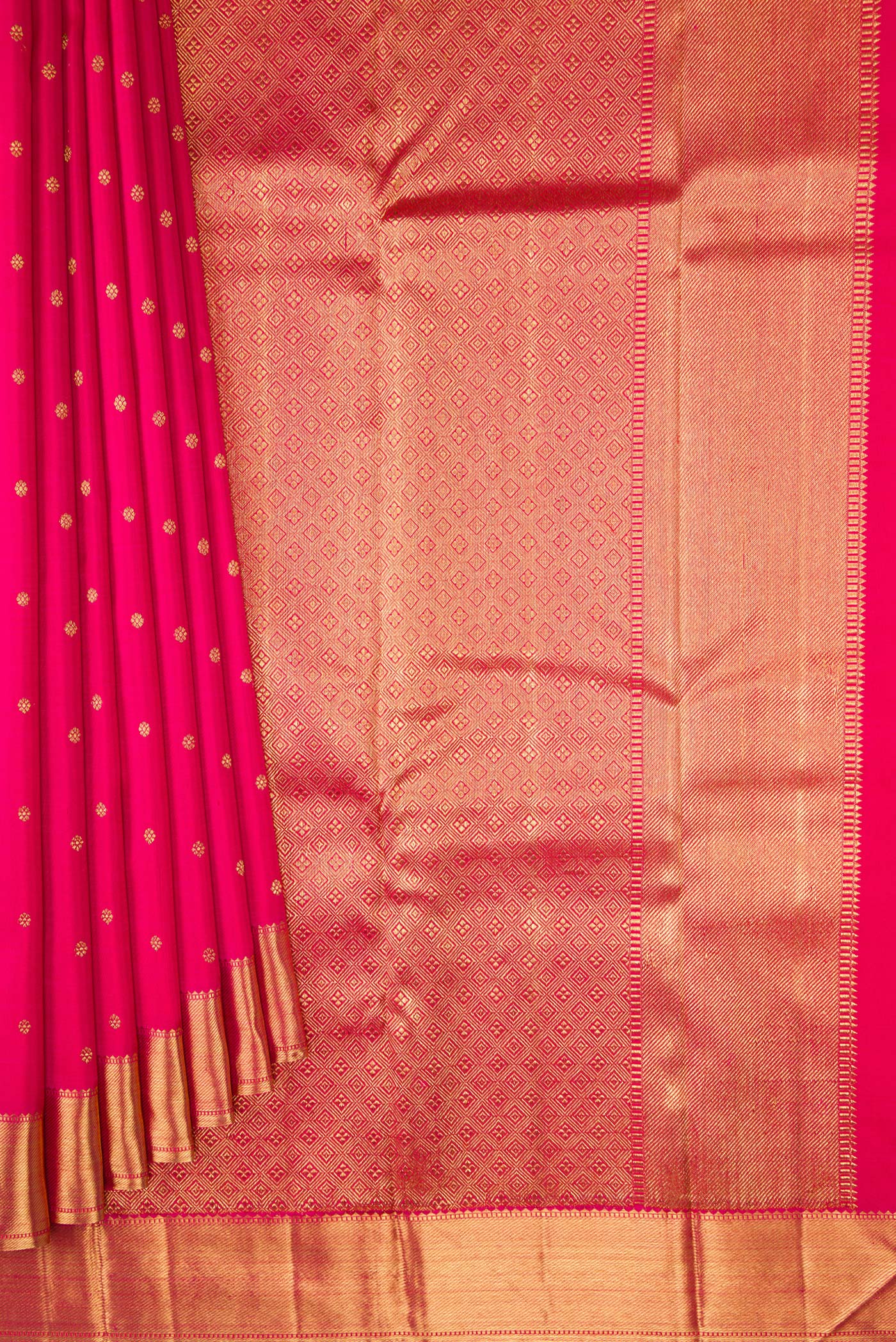 Pleats and pallu of Pure Silk Pure Zari Dark Pink Kanjivaram Saree with Zari Butta on the body and Zari Border. 
