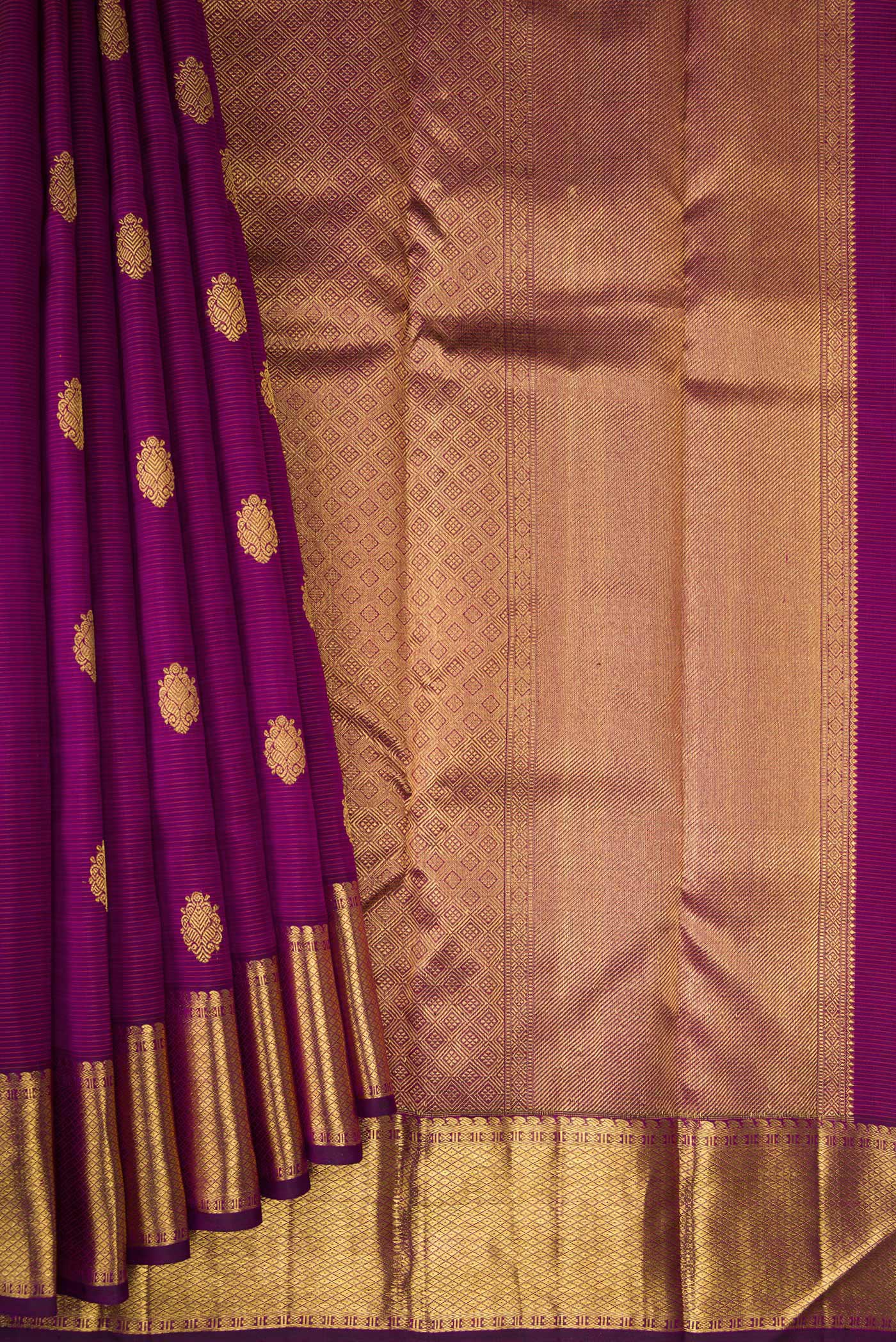 Pleats and pallu of Pure Silk Pure Zari Purple Kanjivaram Saree with Stripes on the body and Zari Border. 