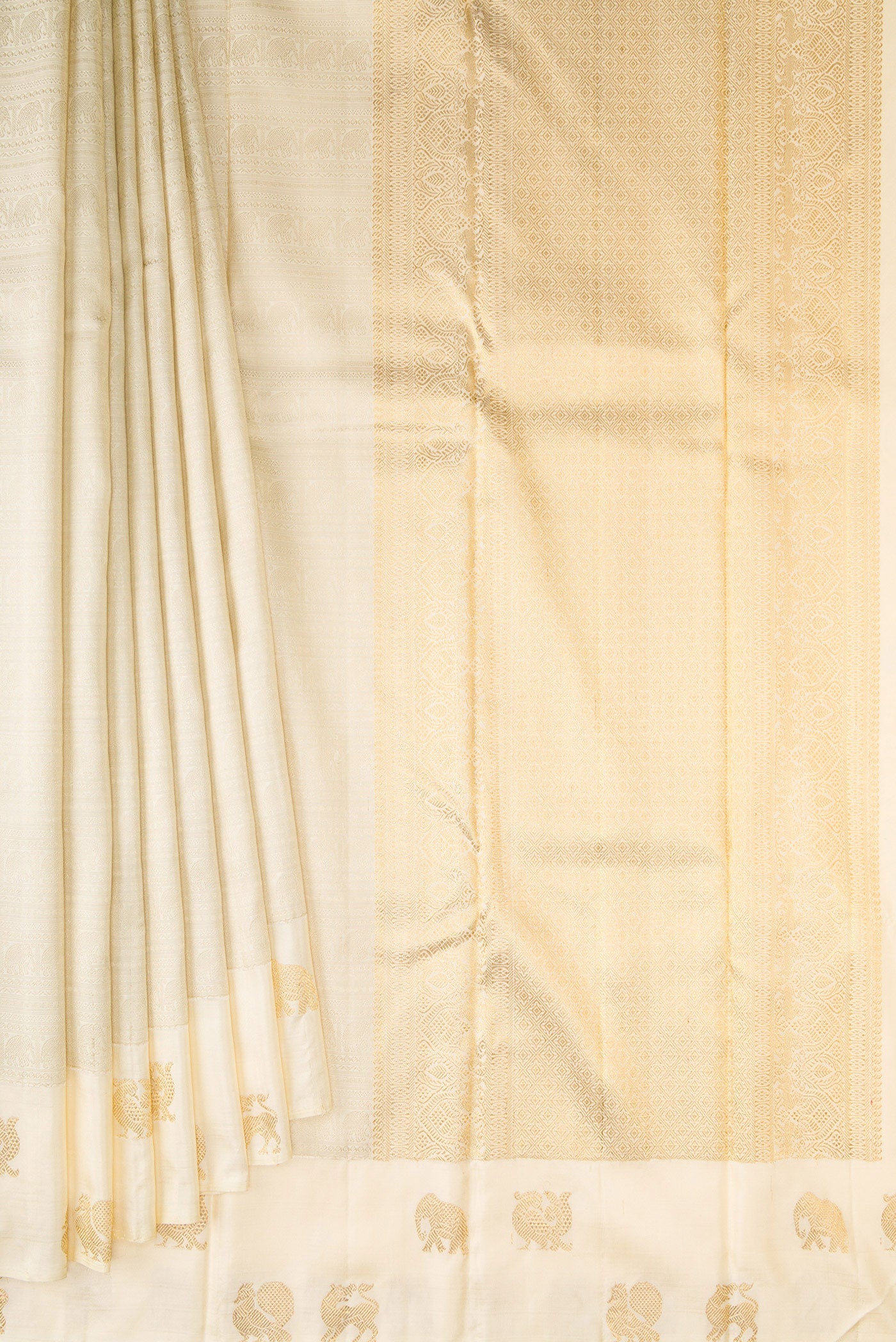 Pleats and pallu of Pure Silk Pure Zari Cream Kanjivaram Saree with Jacquard design on the body and Fancy Border. 