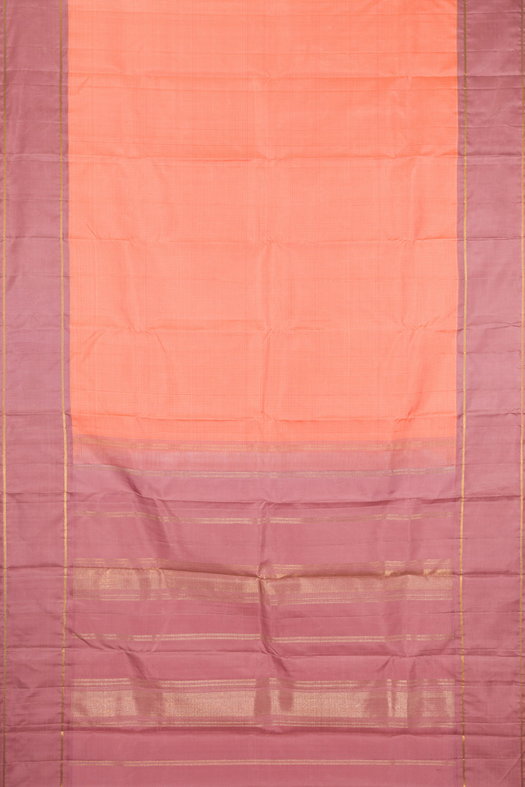 Flat view of Peach Kanjivaram Silk Saree with Zari Butta on the body and Plain Border. 