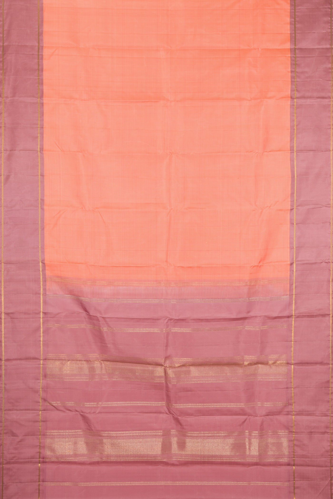 Flat view of Peach Kanjivaram Silk Saree with Zari Butta on the body and Plain Border. 
