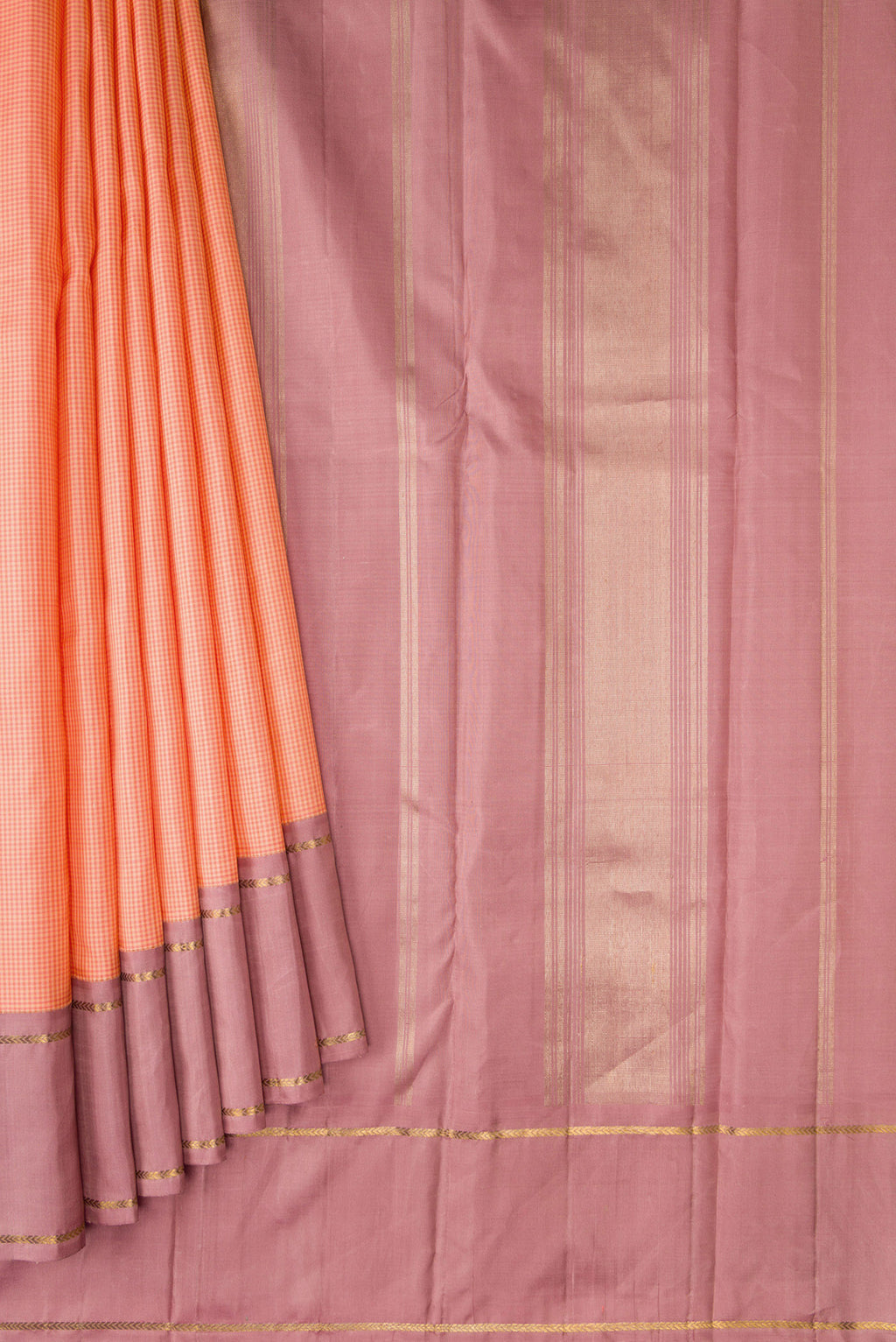 Pleats and pallu of Peach Kanjivaram Silk Saree with Zari Butta on the body and Plain Border. 