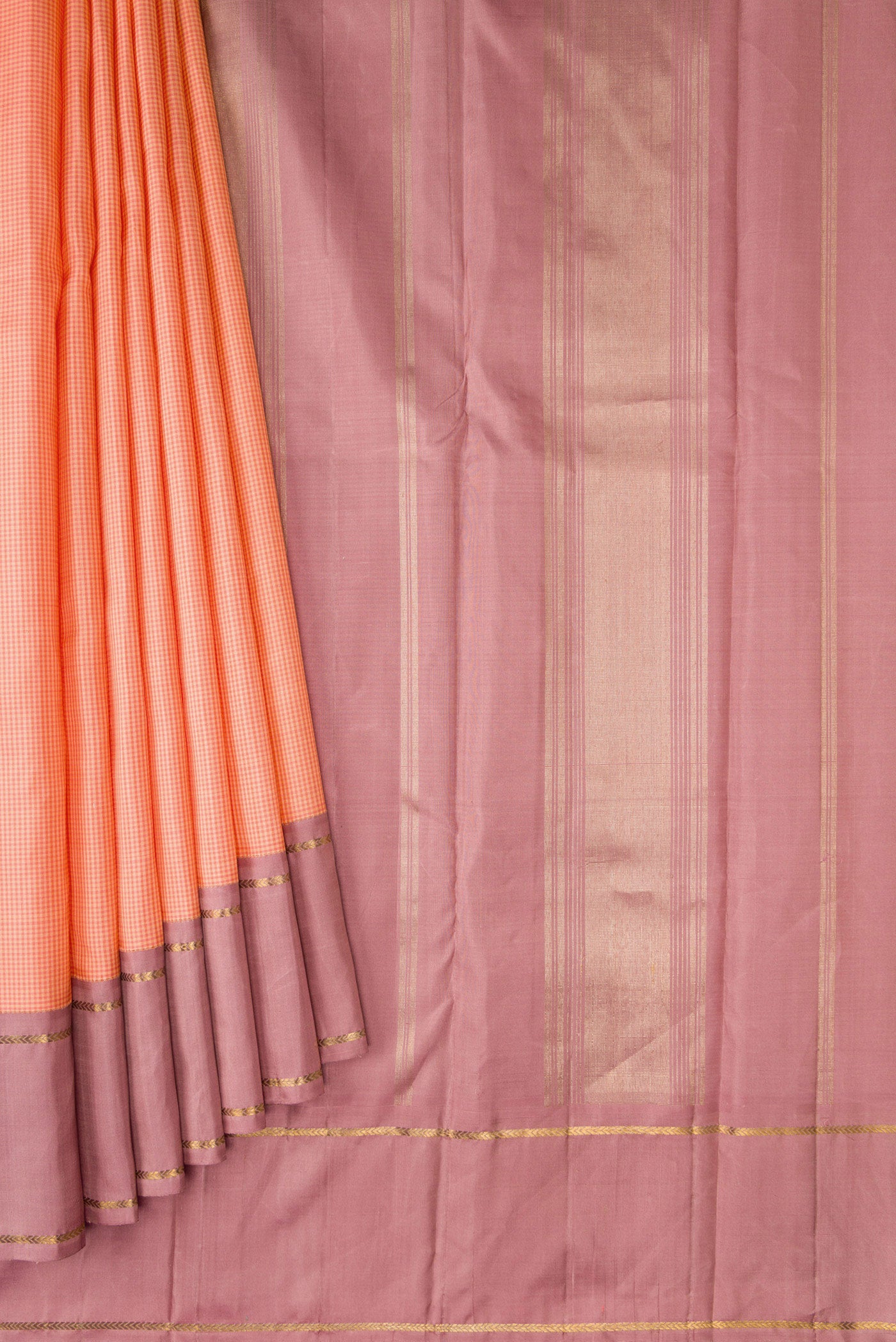Pleats and pallu of Peach Kanjivaram Silk Saree with Zari Butta on the body and Plain Border. 