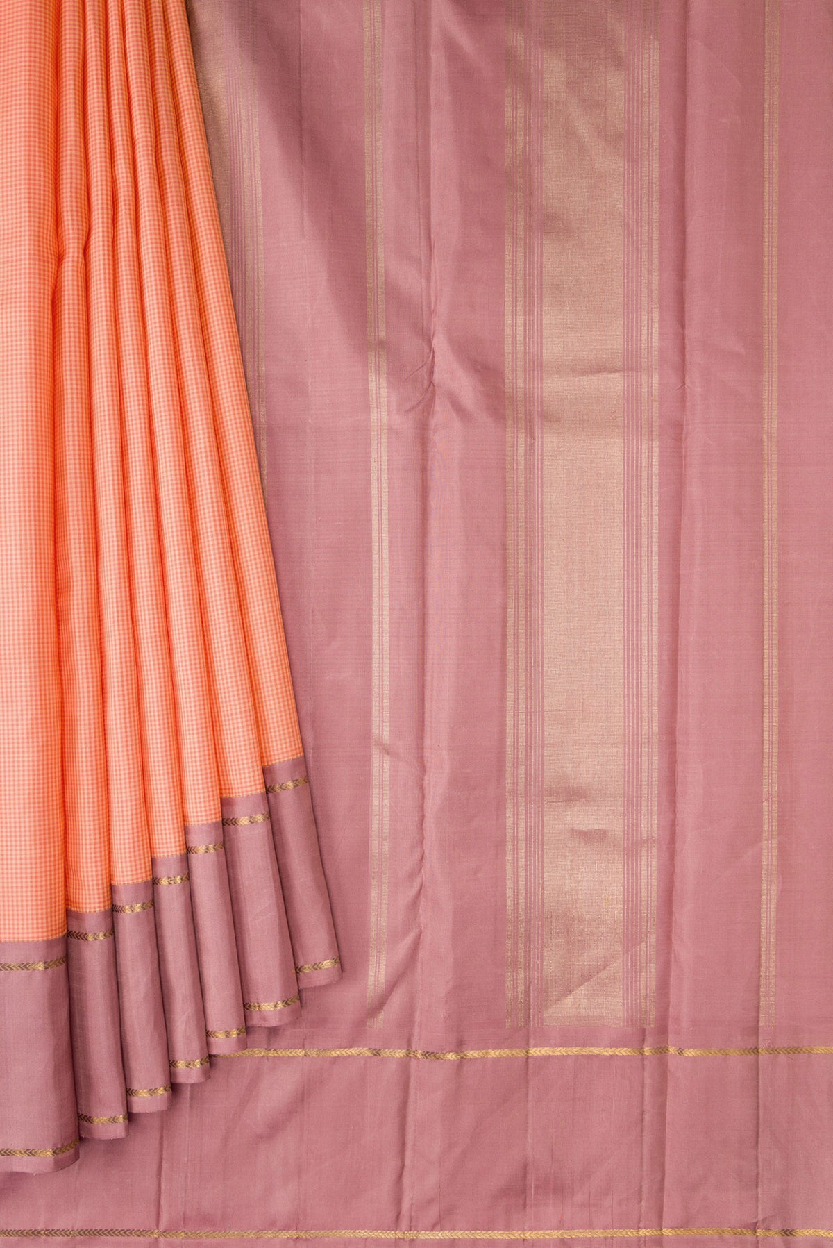 Pleats and pallu of Peach Kanjivaram Silk Saree with Zari Butta on the body and Plain Border. 