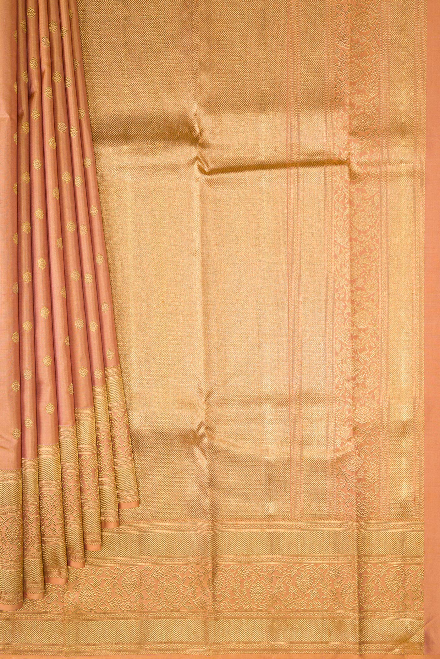 Pleats and pallu of Pure Silk Pure Zari Golden Peach Kanjivaram Saree with Zari Butta on the body and Fancy Border. 