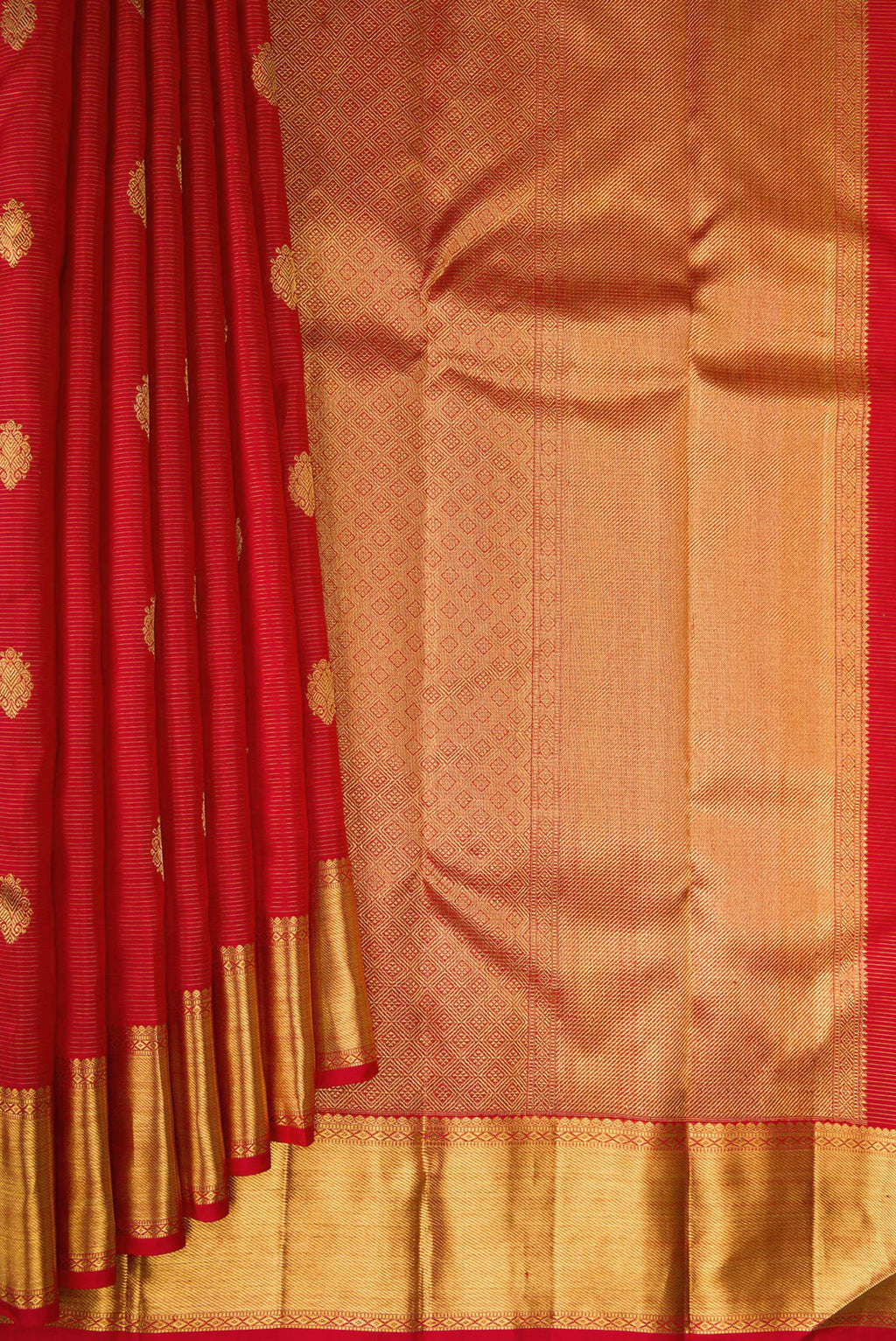 Pleats and pallu of Pure Silk Pure Zari Deep Red Kanjivaram Saree with Stripes on the body and Zari Border. 