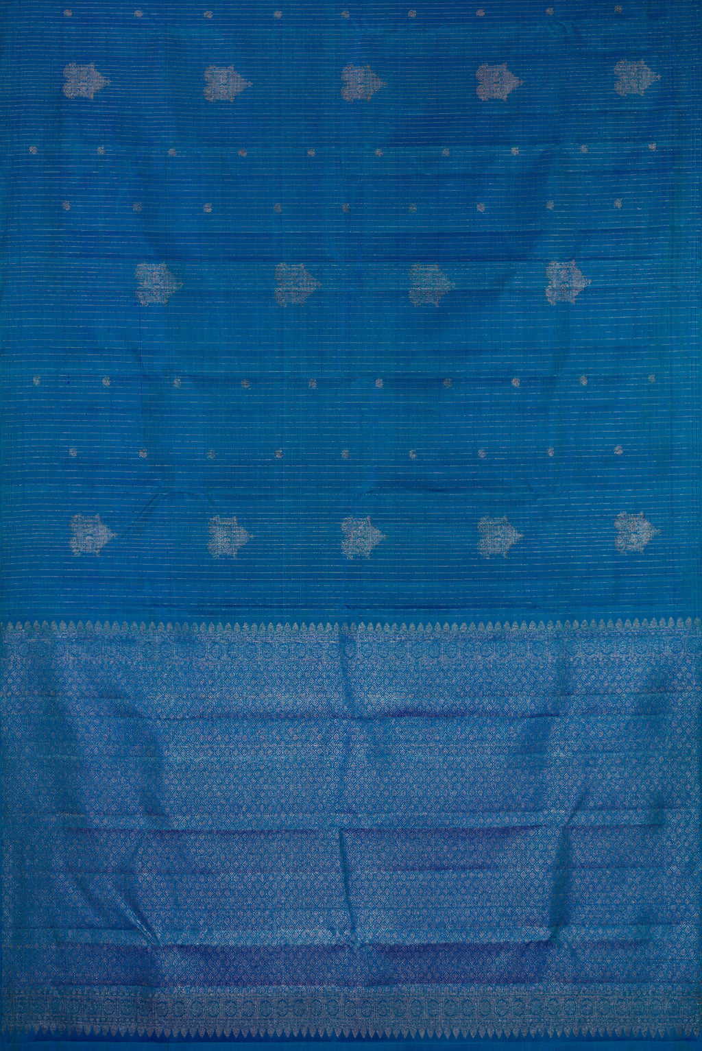 Flat view of Peacock Blue Dual Tone Kanjivaram Silk Saree with Stripes on the body and Without Border. 