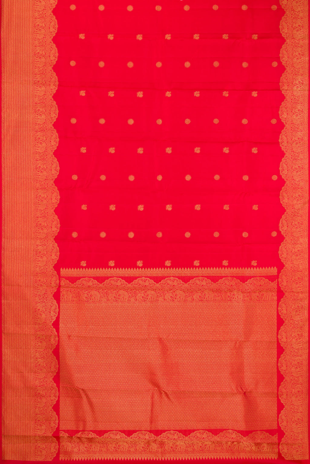 Flat view of Red Kanchipuram Silk Saree with Zari Butta on the body and Fancy Border. 