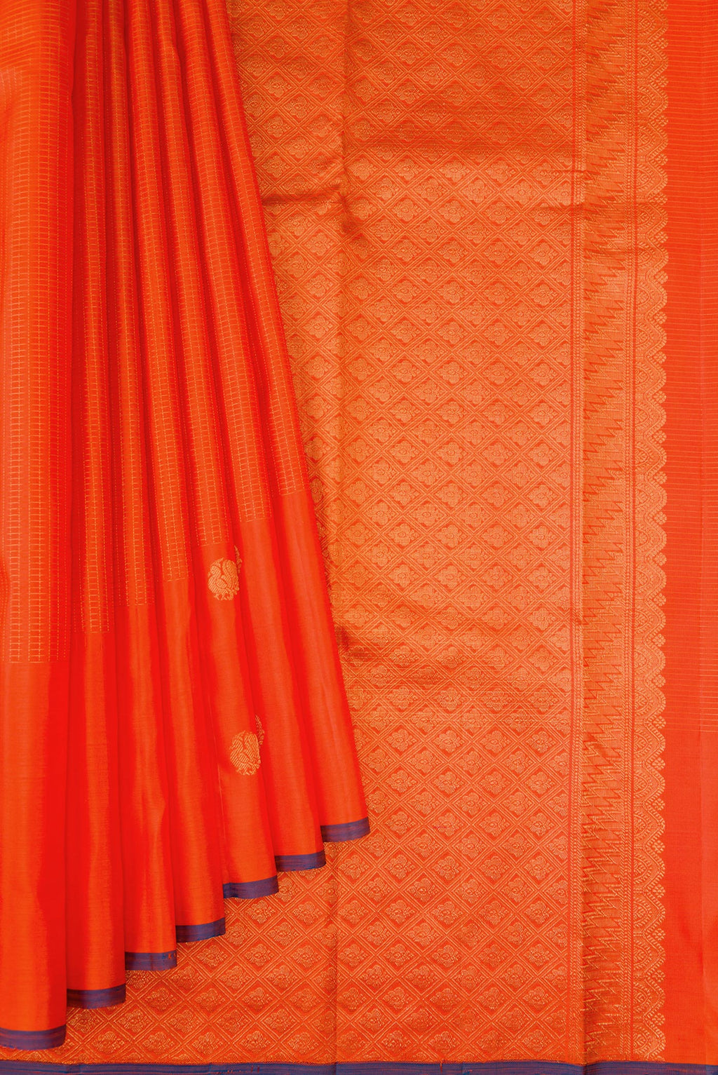 Pleats and pallu of Orange Kanjivaram Silk Saree with Checked design on the body and Fancy Border. 