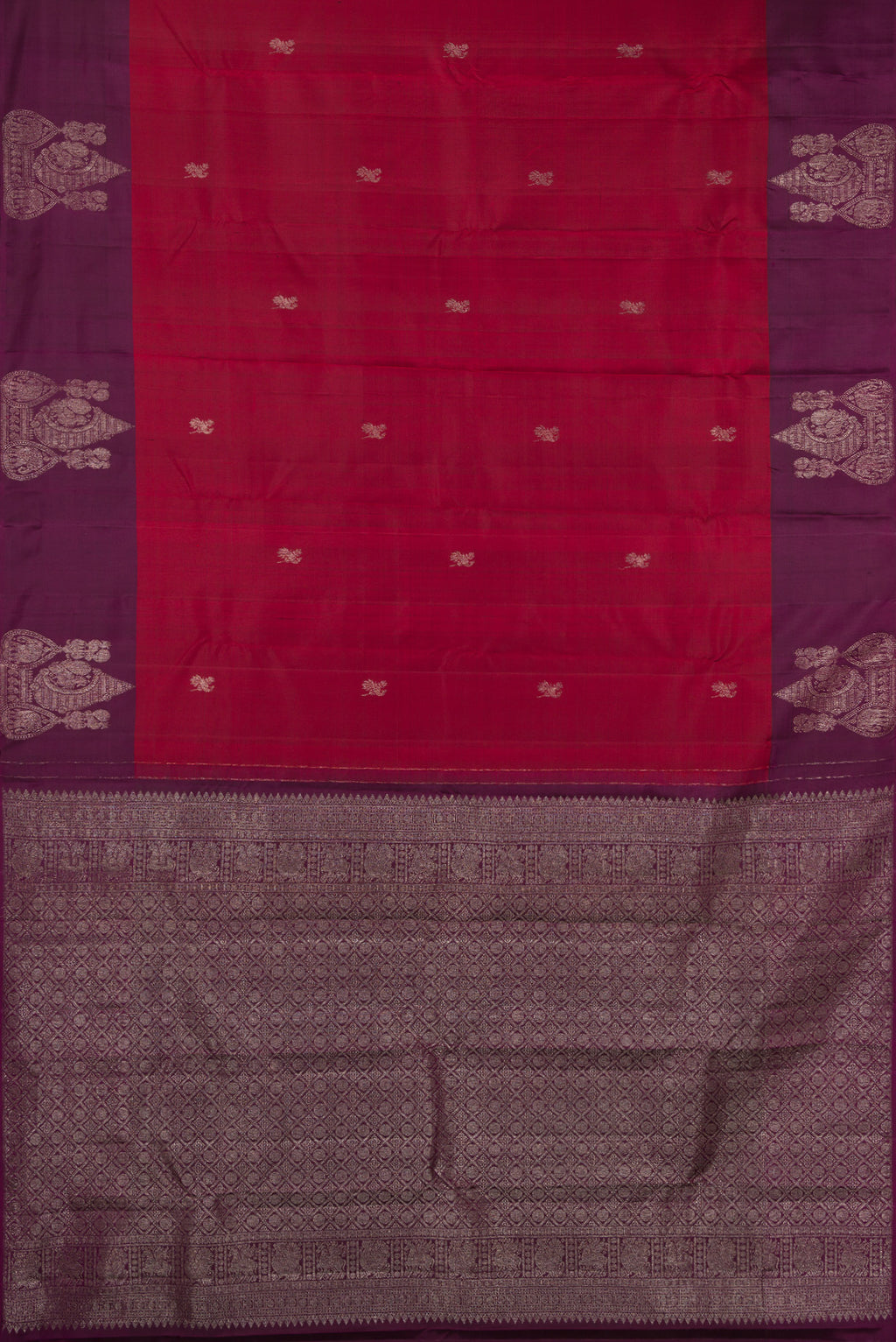 Flat view of Maroon Kanchipuram Silk Saree with Zari Butta on the body and Fancy Border. 