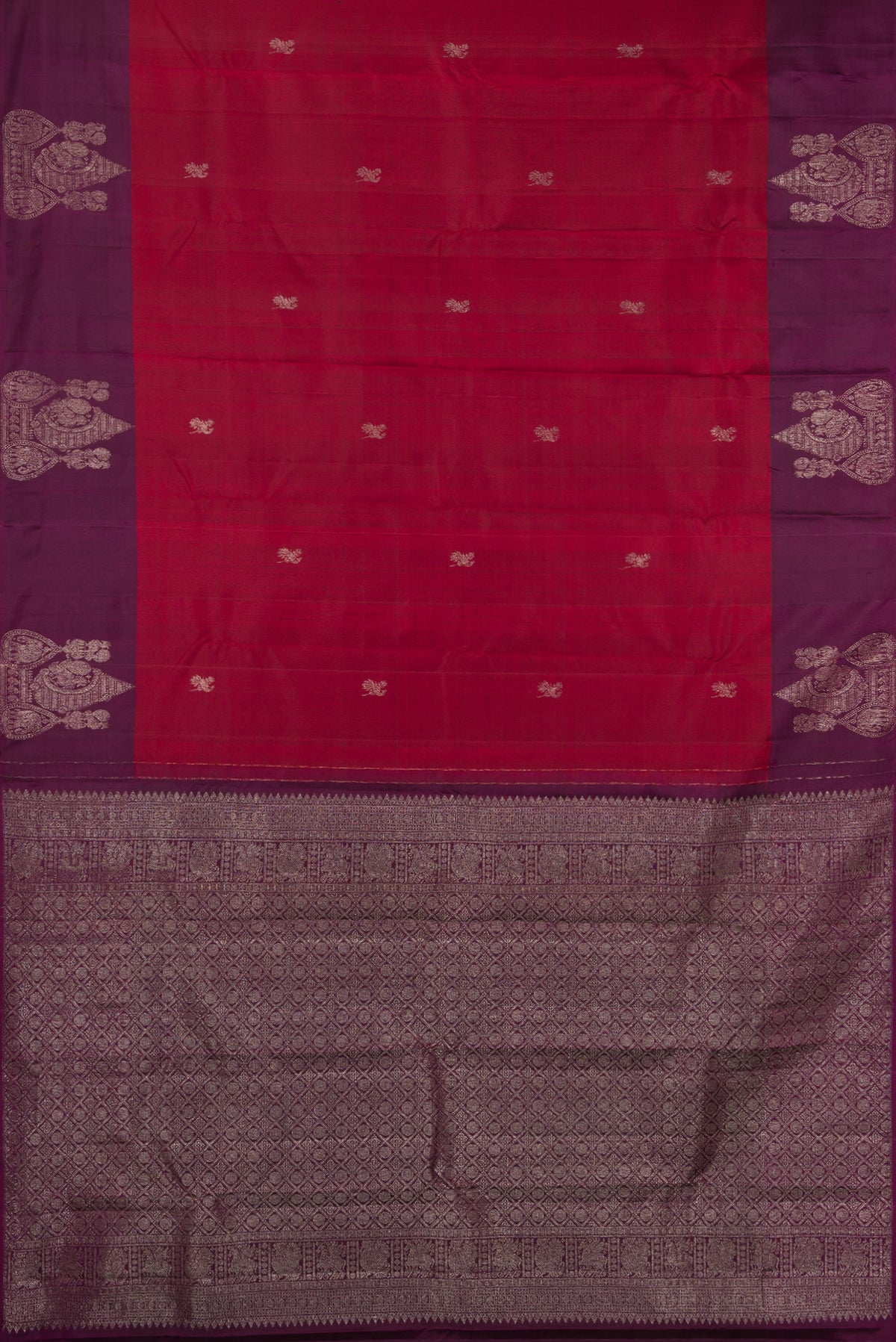 Flat view of Maroon Kanchipuram Silk Saree with Zari Butta on the body and Fancy Border. 