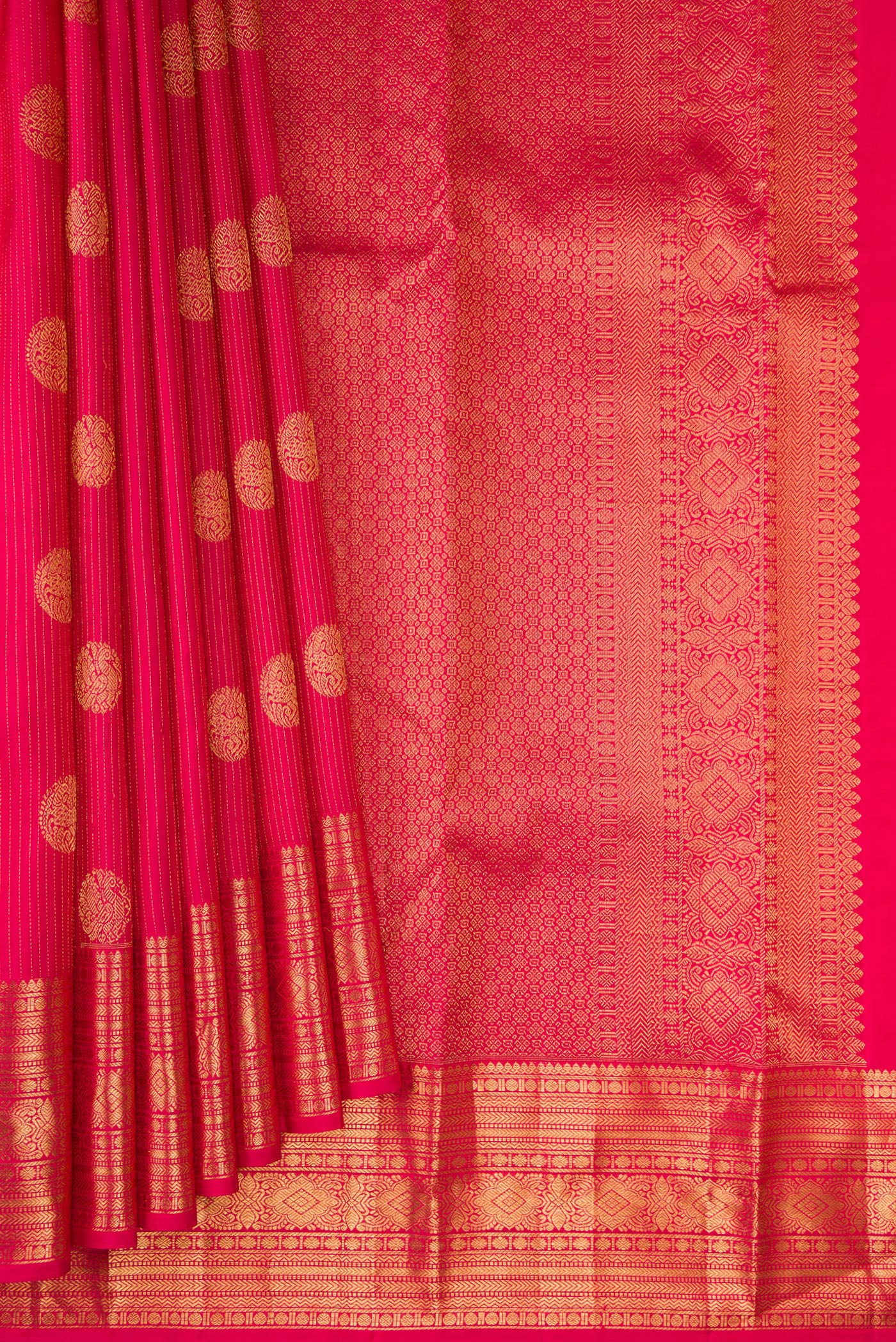 Pleats and pallu of Dark Pink Kanjivaram Silk Saree with Stripes on the body and Zari Border. 