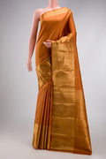 Mustard Kanjivaram Silk Saree with Stripes on the body and Zari Border.  displayed on a mannequin
