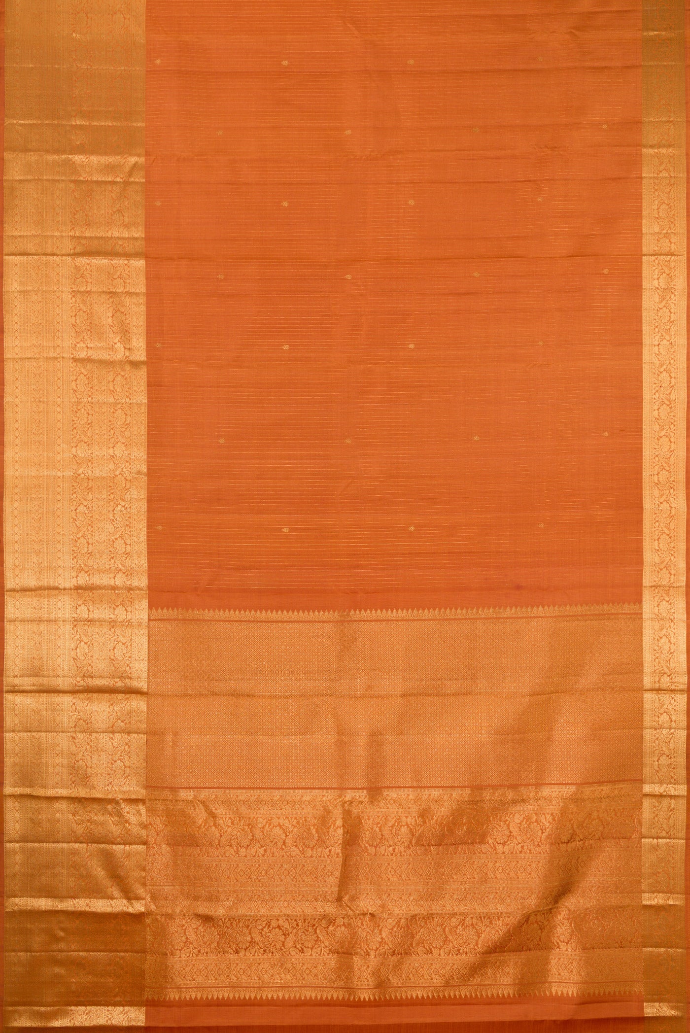 Flat view of Mustard Kanjivaram Silk Saree with Stripes on the body and Zari Border. 