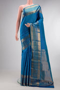 Pure Silk Peacock Blue Kanjivaram Saree with Checked design on the body and Zari Border.  displayed on a mannequin