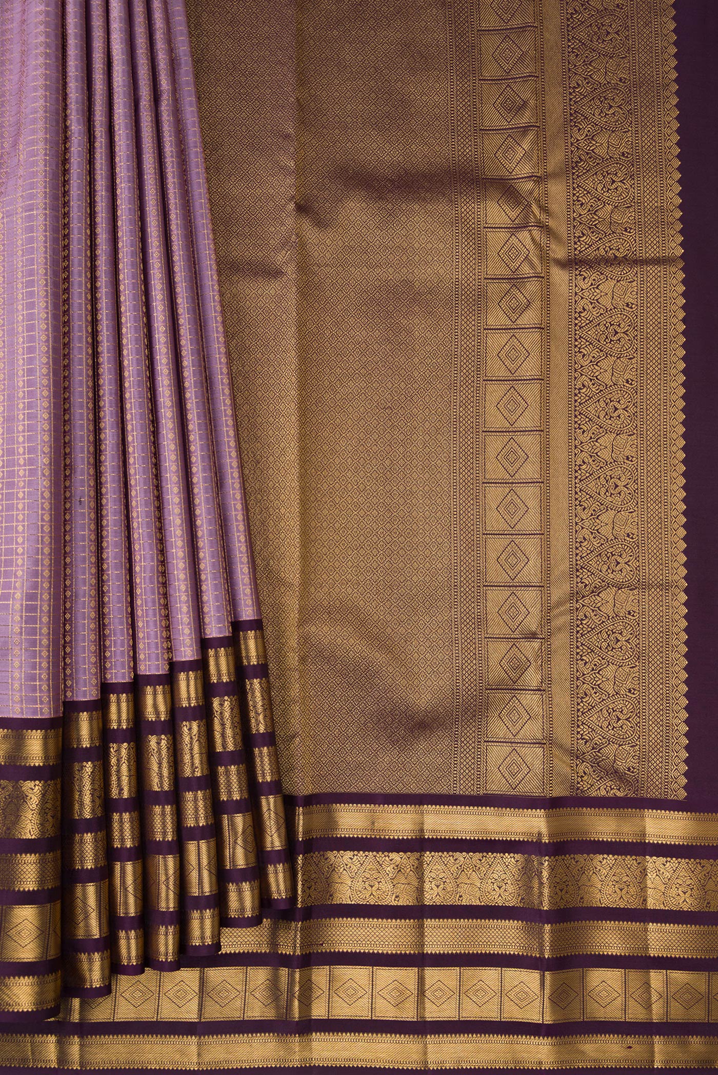 Pleats and pallu of Lavender Dual Tone Kanjivaram Silk Saree with Checked design on the body and Fancy Border. 